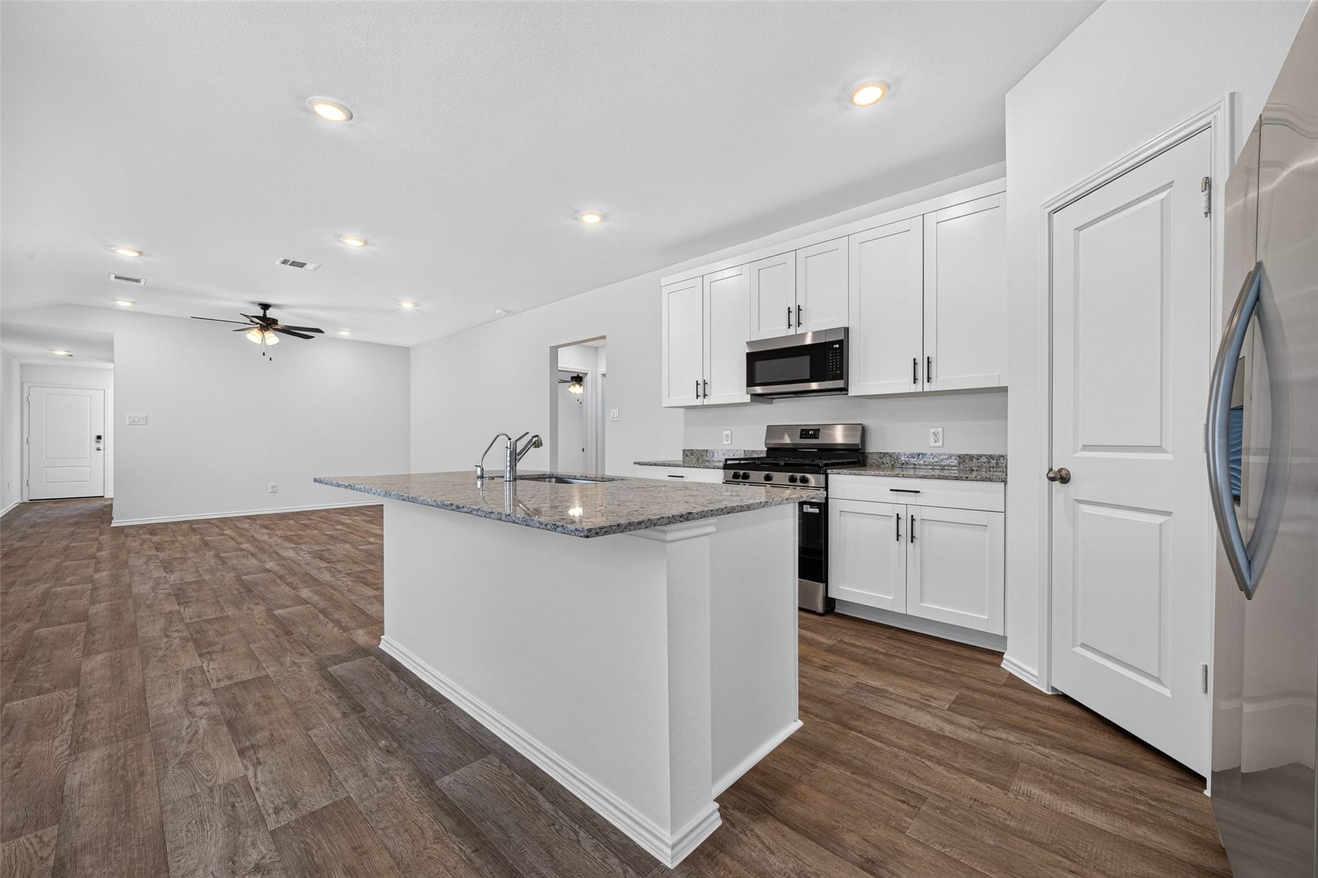 31214 Carmelas Landing Drive, Fulshear, TX 77441 Another view of the kitchen and its stunning features