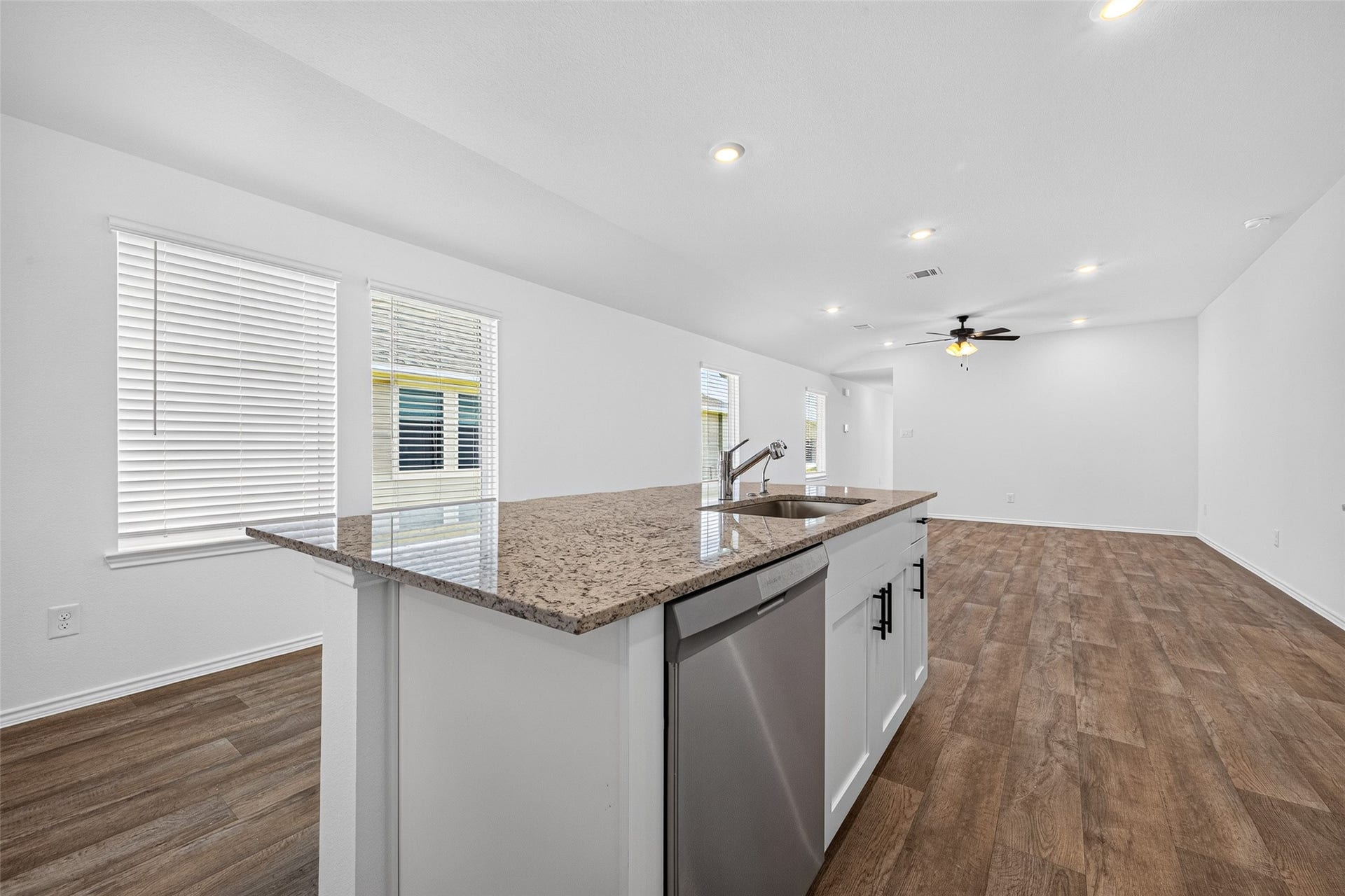 31214 Carmelas Landing Drive, Fulshear, TX 77441 View of kitchen and family room