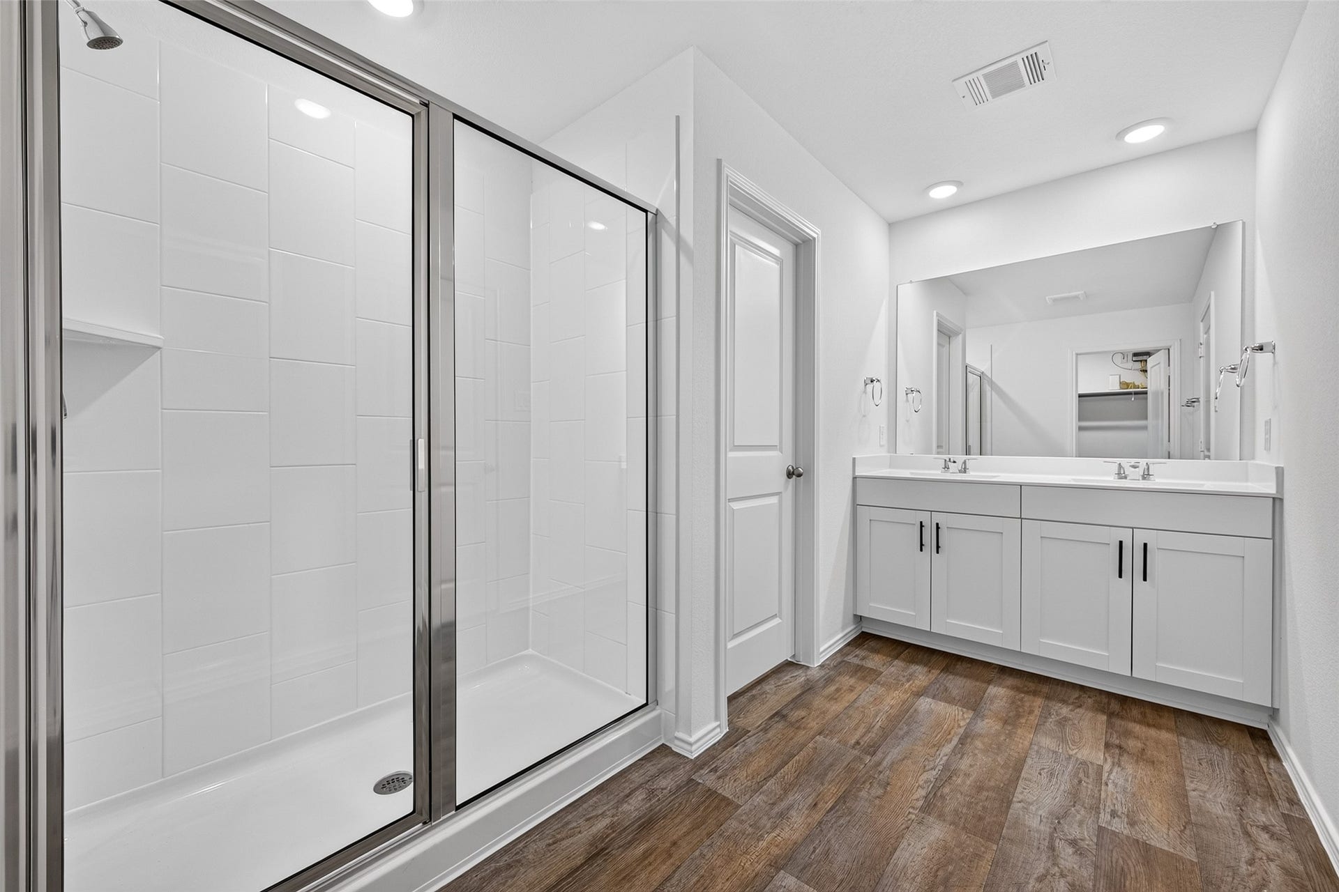 31214 Carmelas Landing Drive, Fulshear, TX 77441 View of double sinks and shower in primary bath