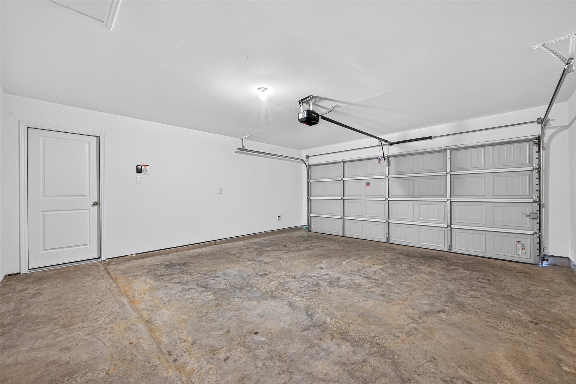 31214 Carmelas Landing Drive, Fulshear, TX 77441 View of garage