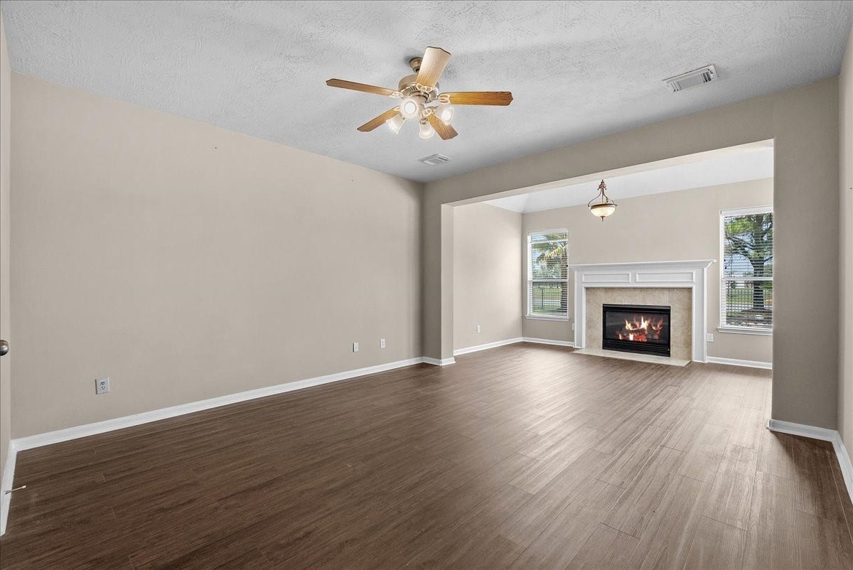 1618 Stoney Lake Drive, Friendswood, TX 77546 Primary suite with sitting area and fireplace!