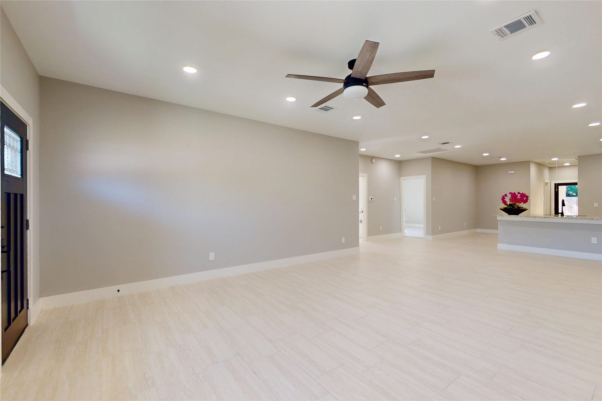 8709 Wheatley Street, Houston, TX 77088 Unit A: Open living area flowing toward the front entrance