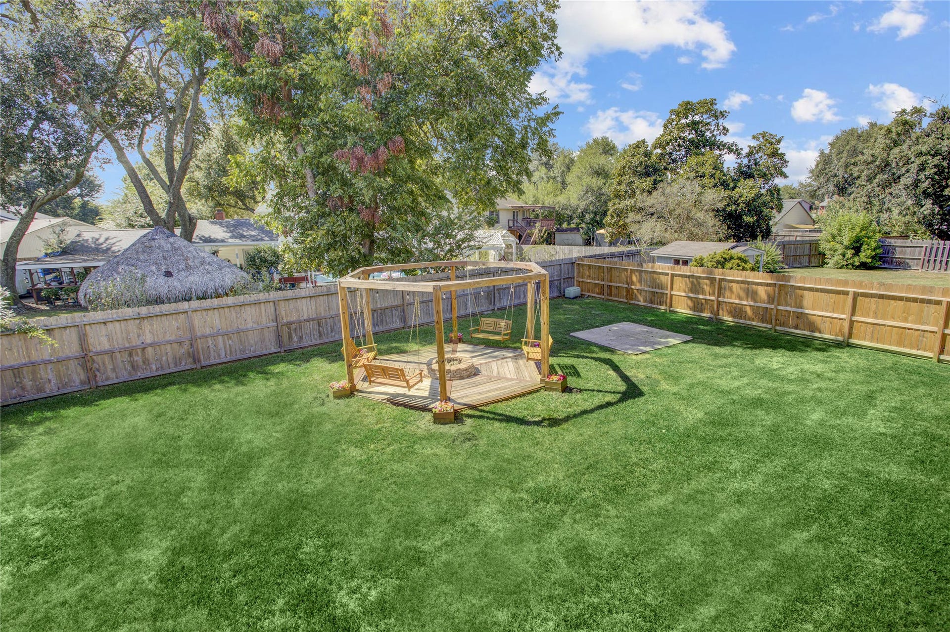A view of the spacious back yard from the top deck