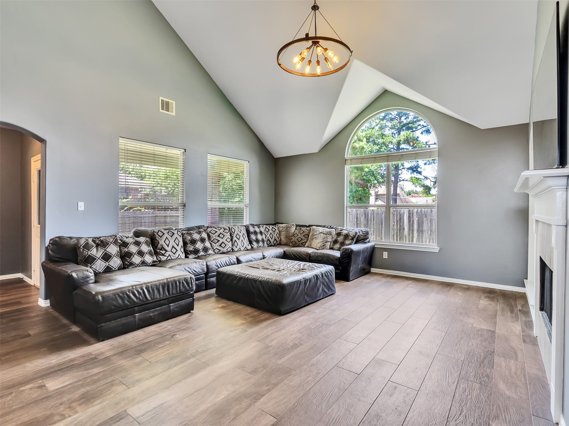 Enjoy this spacious living room and vaulted ceilings
