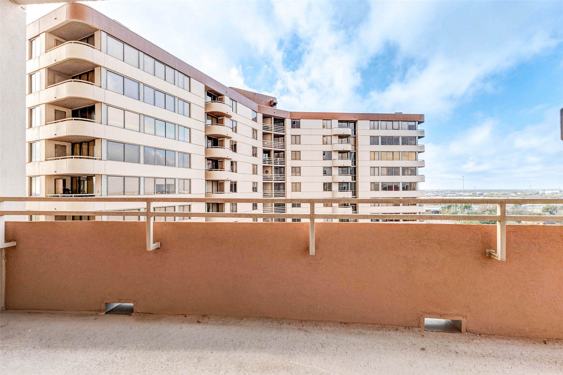 3505 Sage Road, #1104, Houston, TX 77056 Step outside onto the private balcony and enjoy elevated views of the surrounding high-rise community and skyline beyond. The spacious outdoor area provides plenty of room for seating, making it an ideal place to relax with morning coffee or unwind in the evening. From this vantage point, you can appreciate the energy of the Galleria district while enjoying the privacy and comfort of your own outdoor retreat high above the city.