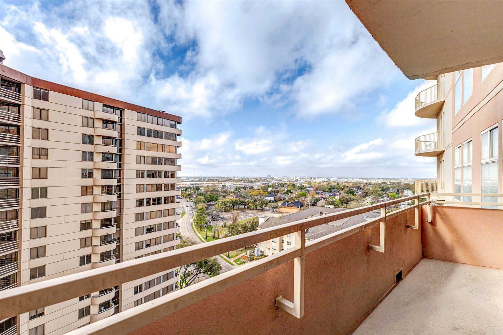 3505 Sage Road, #1104, Houston, TX 77056 Enjoy breathtaking elevated views from the private balcony overlooking the vibrant Houston skyline and surrounding Galleria district. From this vantage point, residents can appreciate sweeping city vistas, nearby high-rise architecture, and tree-lined streets below. The spacious balcony provides plenty of room for outdoor seating, making it the perfect place to start the day with morning coffee or unwind in the evening while taking in the expansive urban landscape.