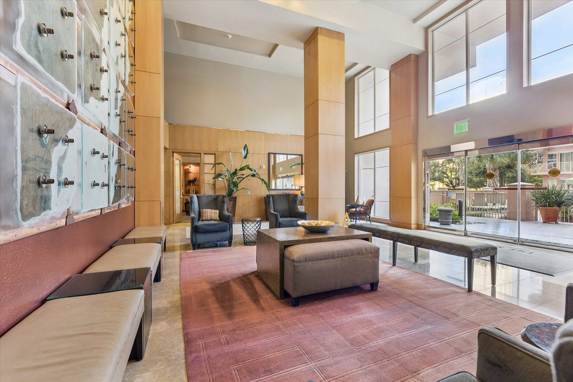 3505 Sage Road, #1104, Houston, TX 77056 The welcoming lobby at The Mark offers a refined first impression with its spacious layout, warm finishes, and comfortable seating areas. Large windows allow natural light to fill the space while modern furnishings create an inviting atmosphere for residents and guests. This elegant common area serves as both a relaxing lounge and a gathering space that reflects the upscale character of the building.