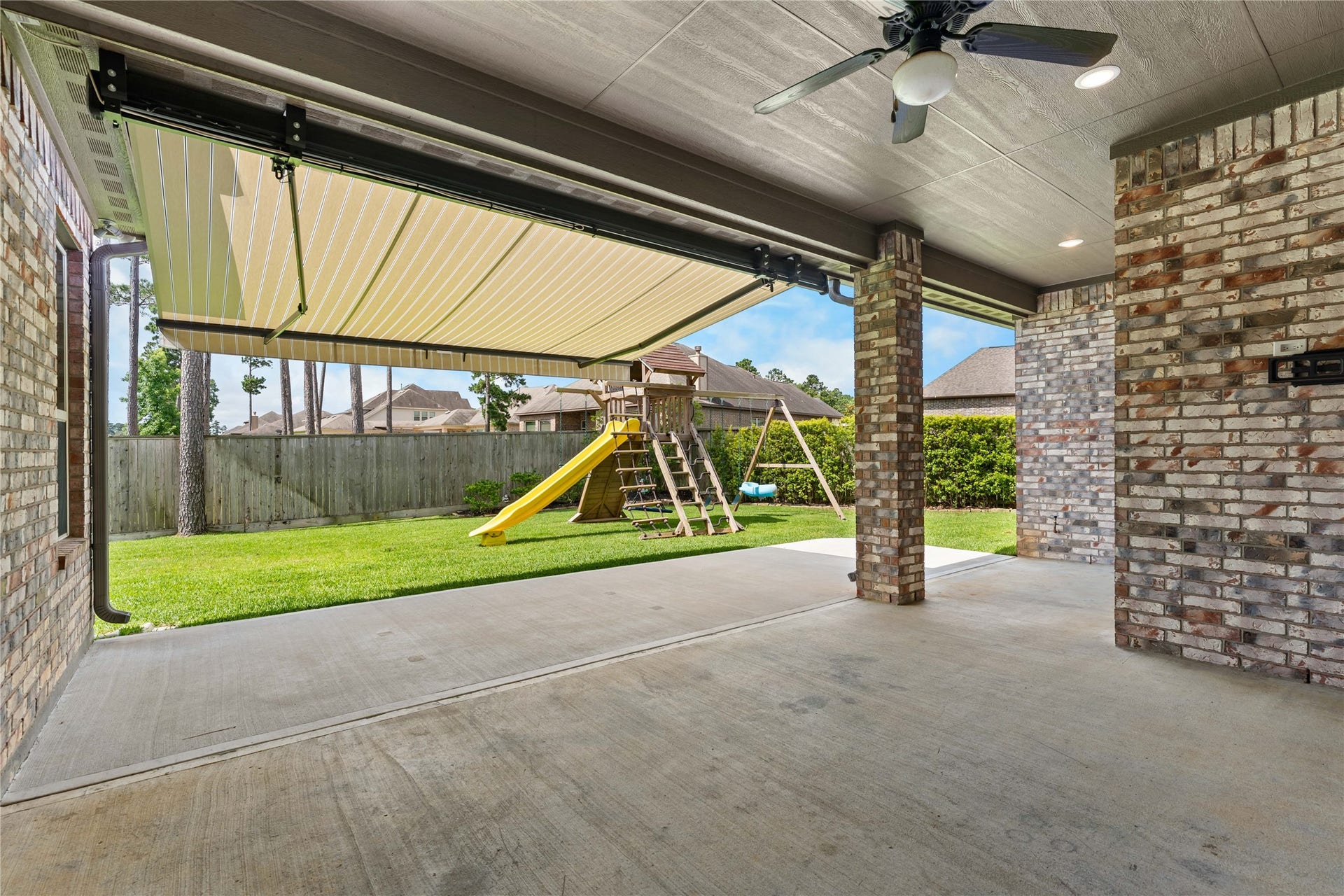 40803 Mostyn Drive, Magnolia, TX 77354 Retractable awning featured