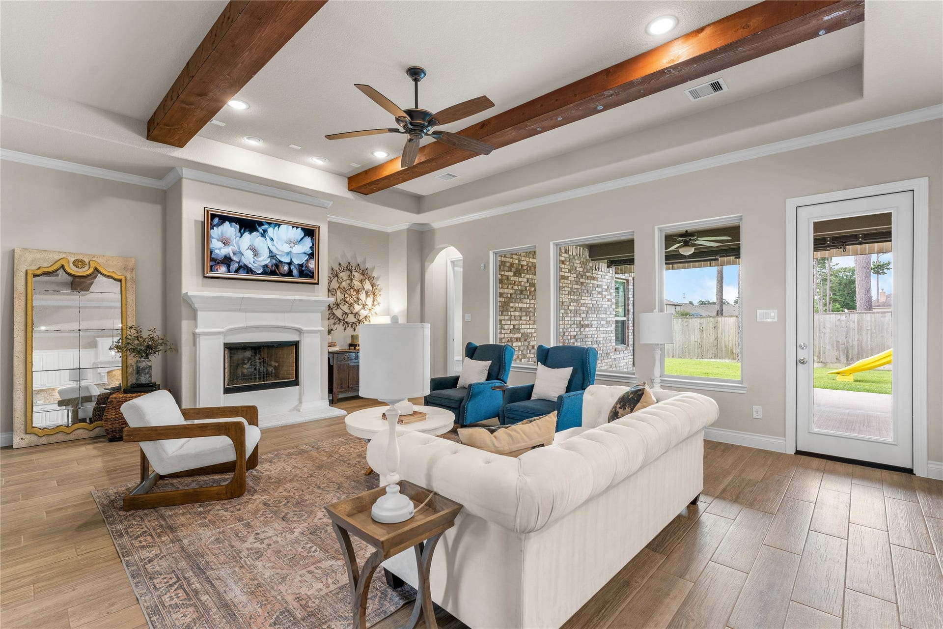 40803 Mostyn Drive, Magnolia, TX 77354 Open living area designed for connection, comfort, and entertaining