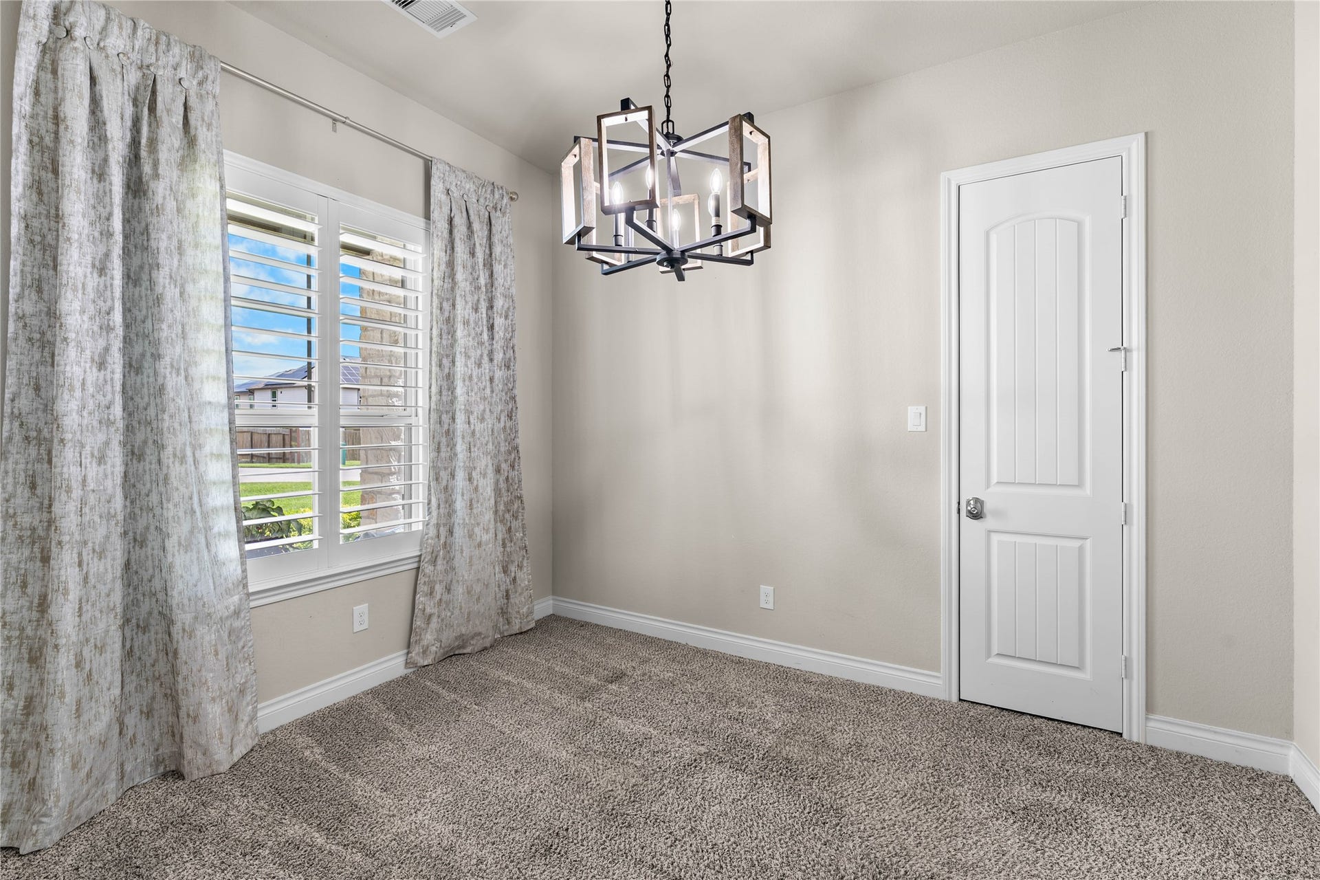 40803 Mostyn Drive, Magnolia, TX 77354 Secondary bedroom with soft natural light and generous proportions.
