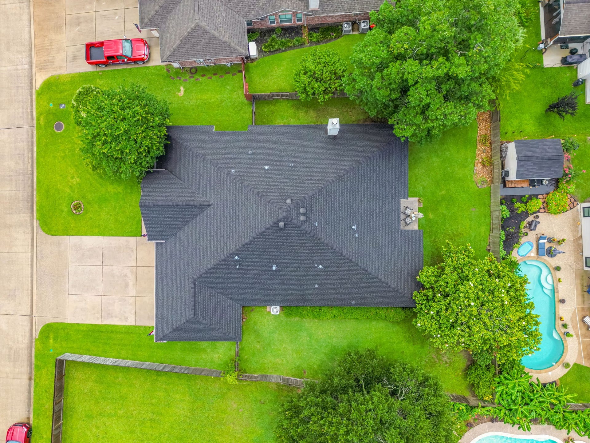 1859 Pembrook Circle, Conroe, TX 77301 1/4 acre of lush lawn, mature trees and room for a pool!