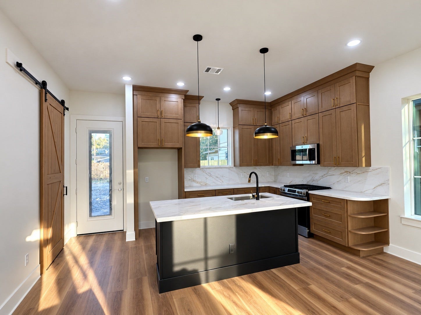 8018 Moon Beam Street, #A/B, Houston, TX 77088 Thoughtfully designed kitchen featuring a
built in bookshelf, barn door pantry, ceiling height cabinetry, and an oversized island with plenty of room to move around and entertain. This photo has been virtually rendered based on the plans for this home.