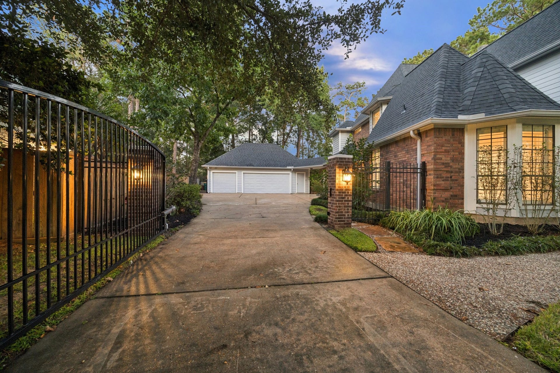 An oversized dettached three car garage, completely finished with walls and epoxy flooring.