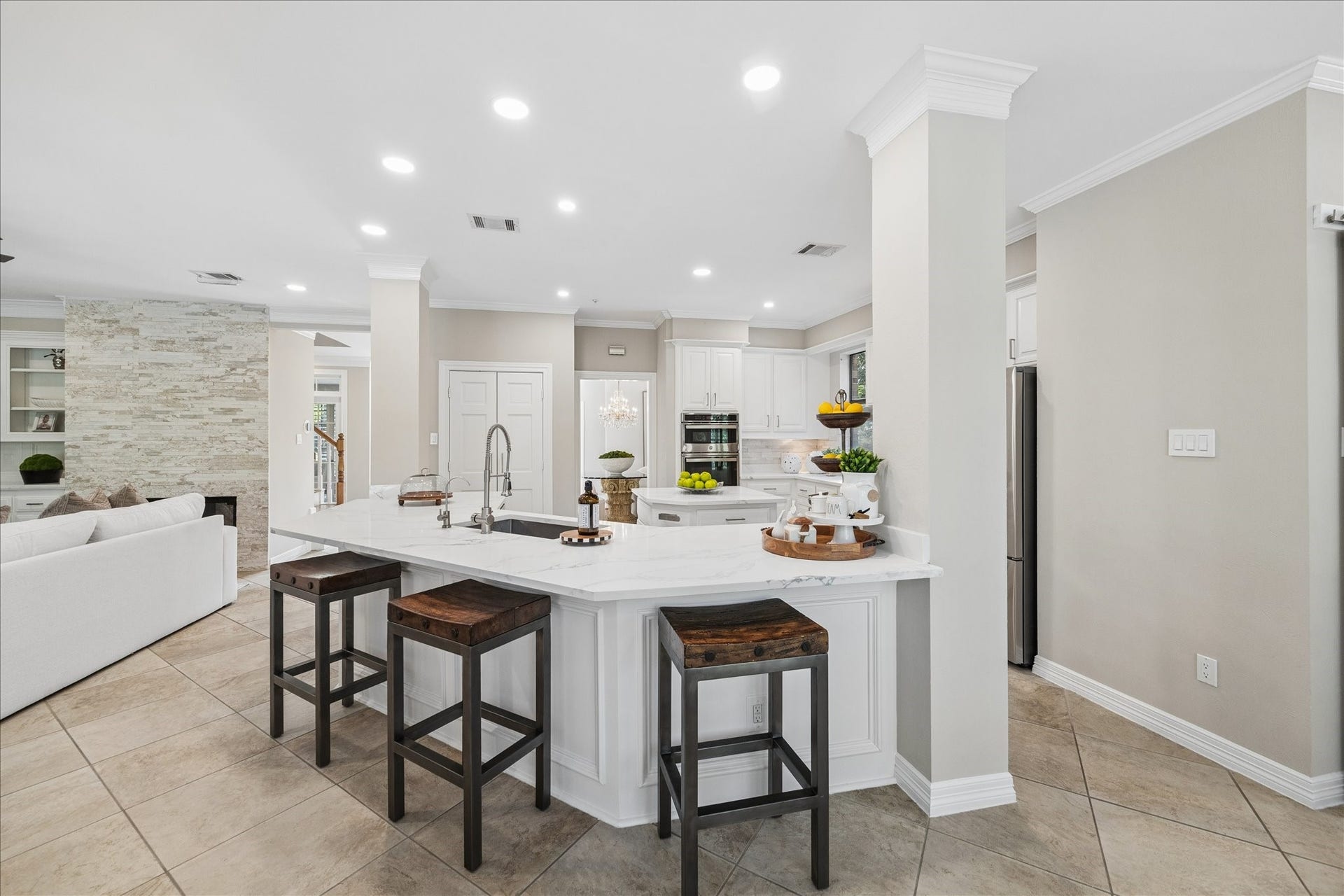 Open-concept living spaces designed for both comfortable living and seamless entertaining.