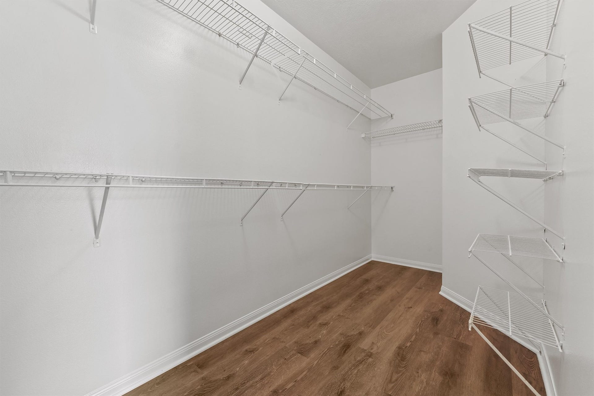 WOW! Look at all the space in this walk in closet.