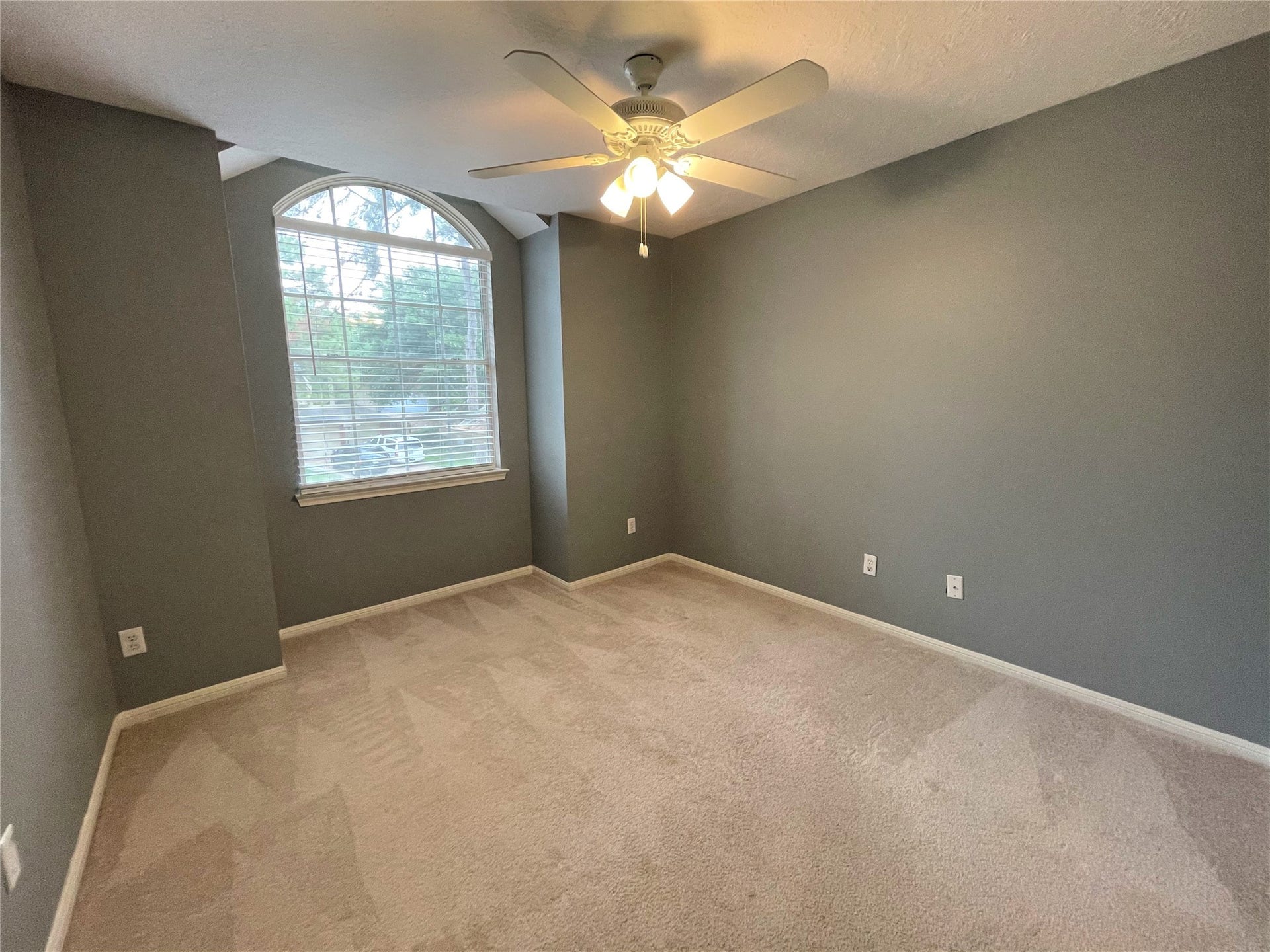 8406 Lake Crystal Drive, Houston, TX 77095 Second bedroom is where comfort and coziness awaits. Featuring a wide window to allow natural sunlight.
