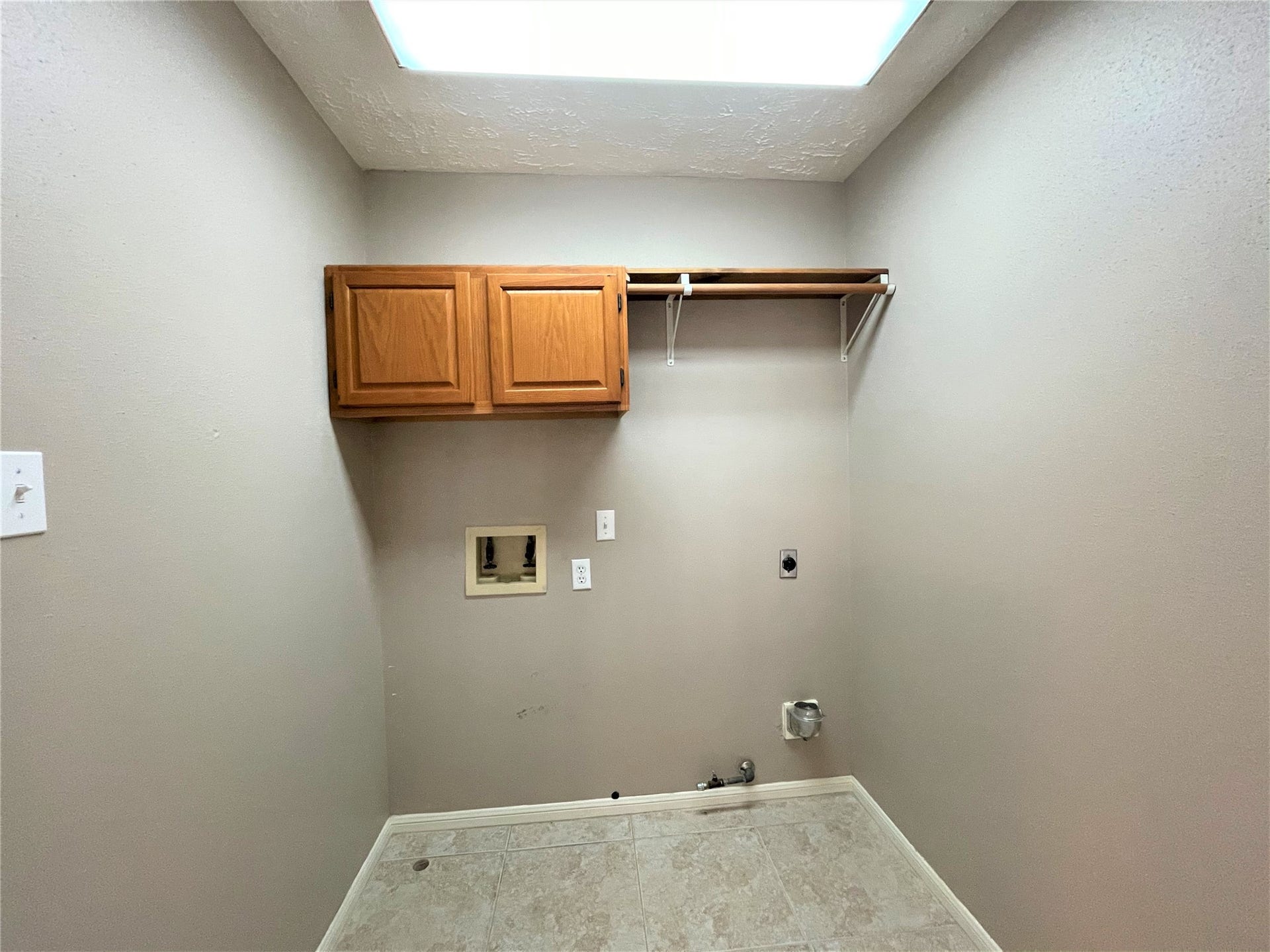 8406 Lake Crystal Drive, Houston, TX 77095 The utility room is strategically positioned within the home, providing easy access for efficiently handling daily chores.