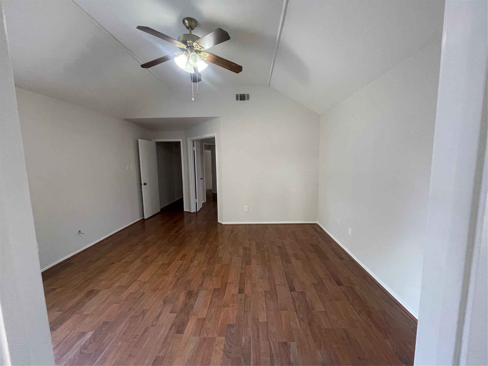 Another view of primary bedroom