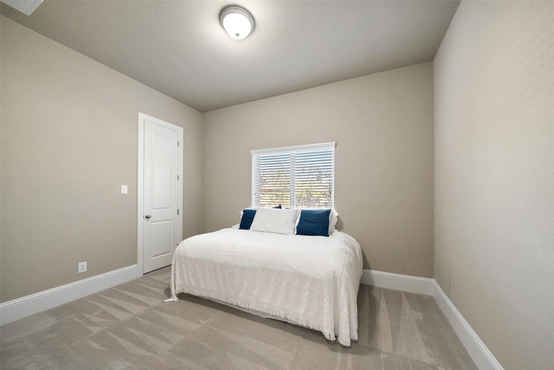 12606 Whitney Court, Magnolia, TX 77354 Secondary bedroom number three offers a walk-in closet.