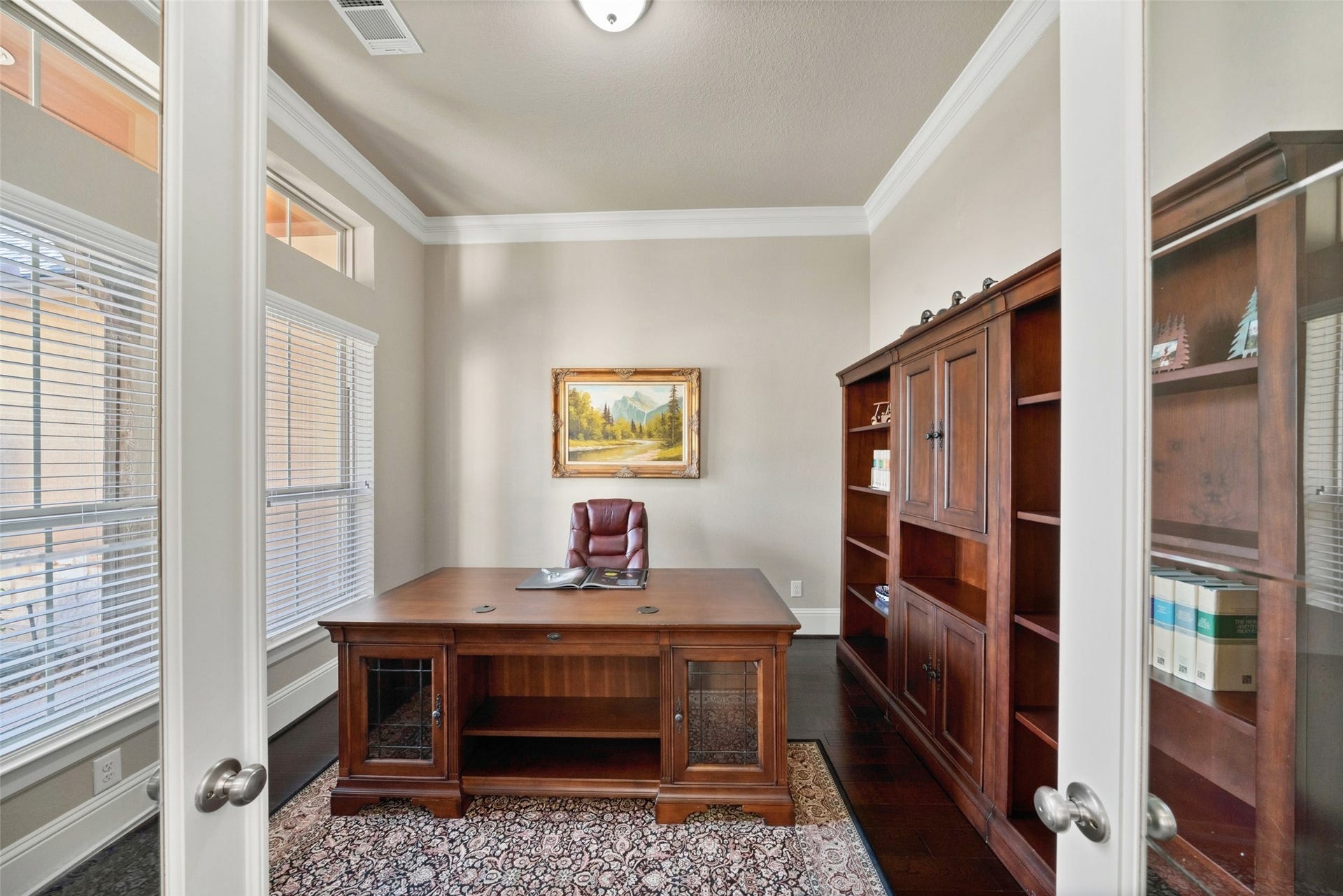 12606 Whitney Court, Magnolia, TX 77354 A spacious home office located near the front entry offers a quiet, dedicated workspace separate from the home's main living areas.