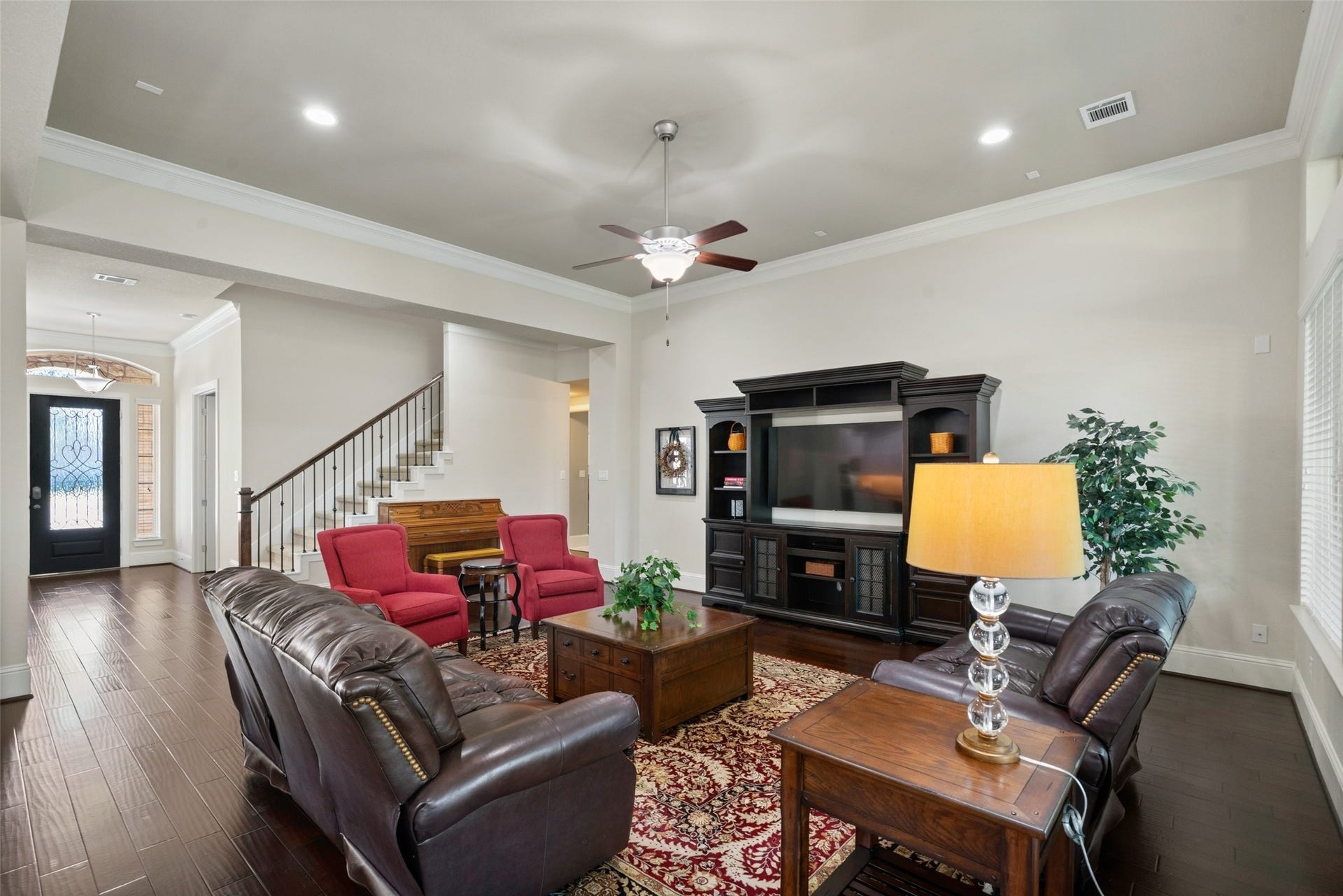 12606 Whitney Court, Magnolia, TX 77354 Beautiful wood floors carry throughout the main living areas, adding warmth to the home's open design.