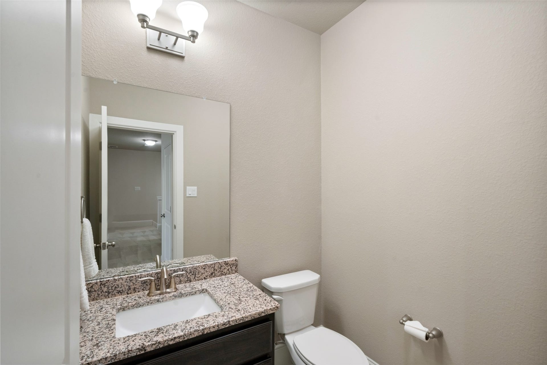 12606 Whitney Court, Magnolia, TX 77354 The second half bath is located upstairs just off the game room.