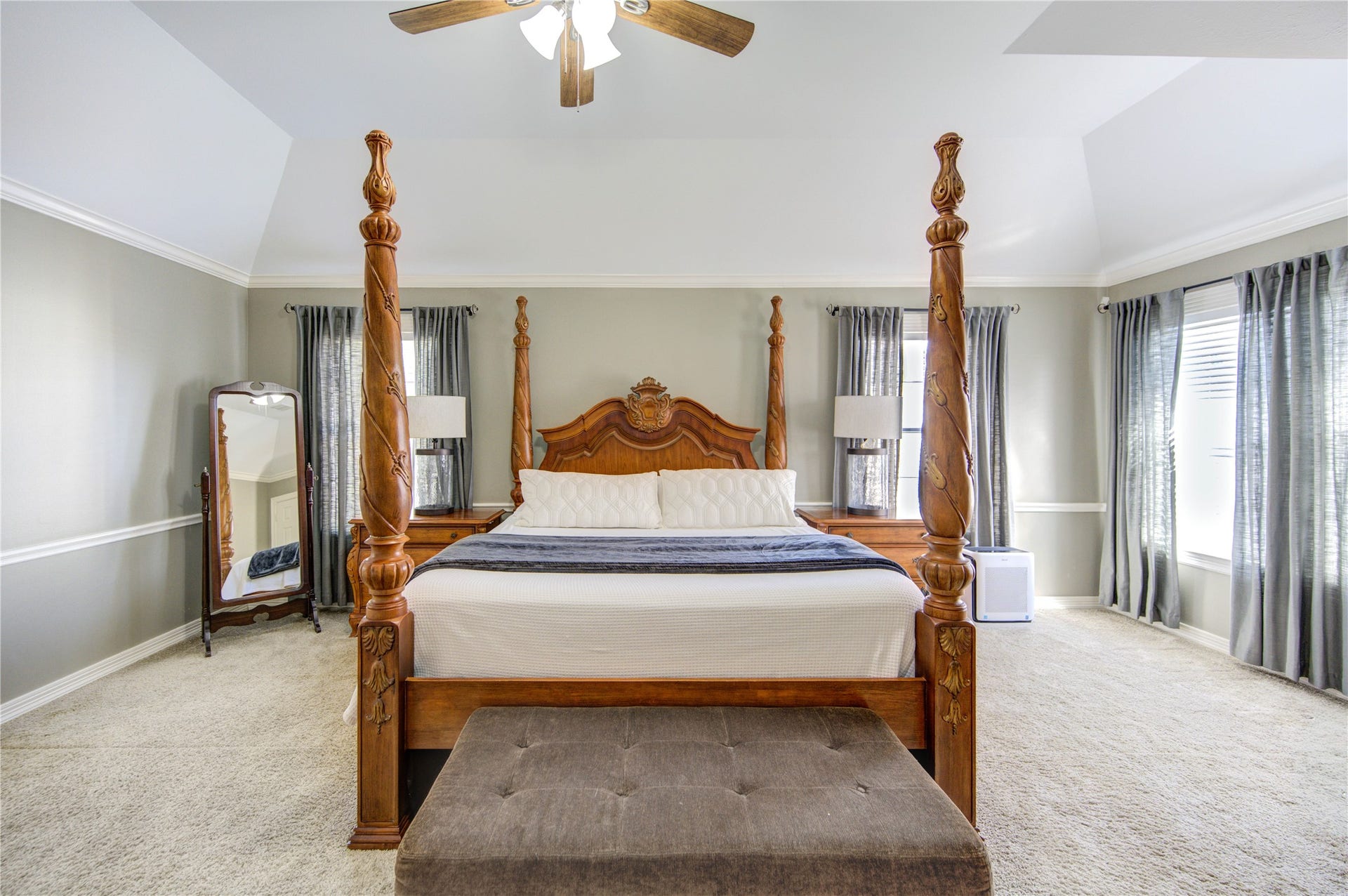 4914 Hillswick Drive, Sugar Land, TX 77479 High ceiling, crown molding and natural light filters in the primary bedroom.