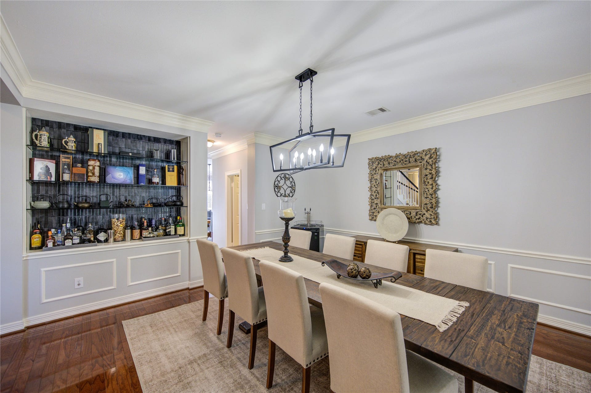 4914 Hillswick Drive, Sugar Land, TX 77479 Formal dining area with built-in for showcasing.