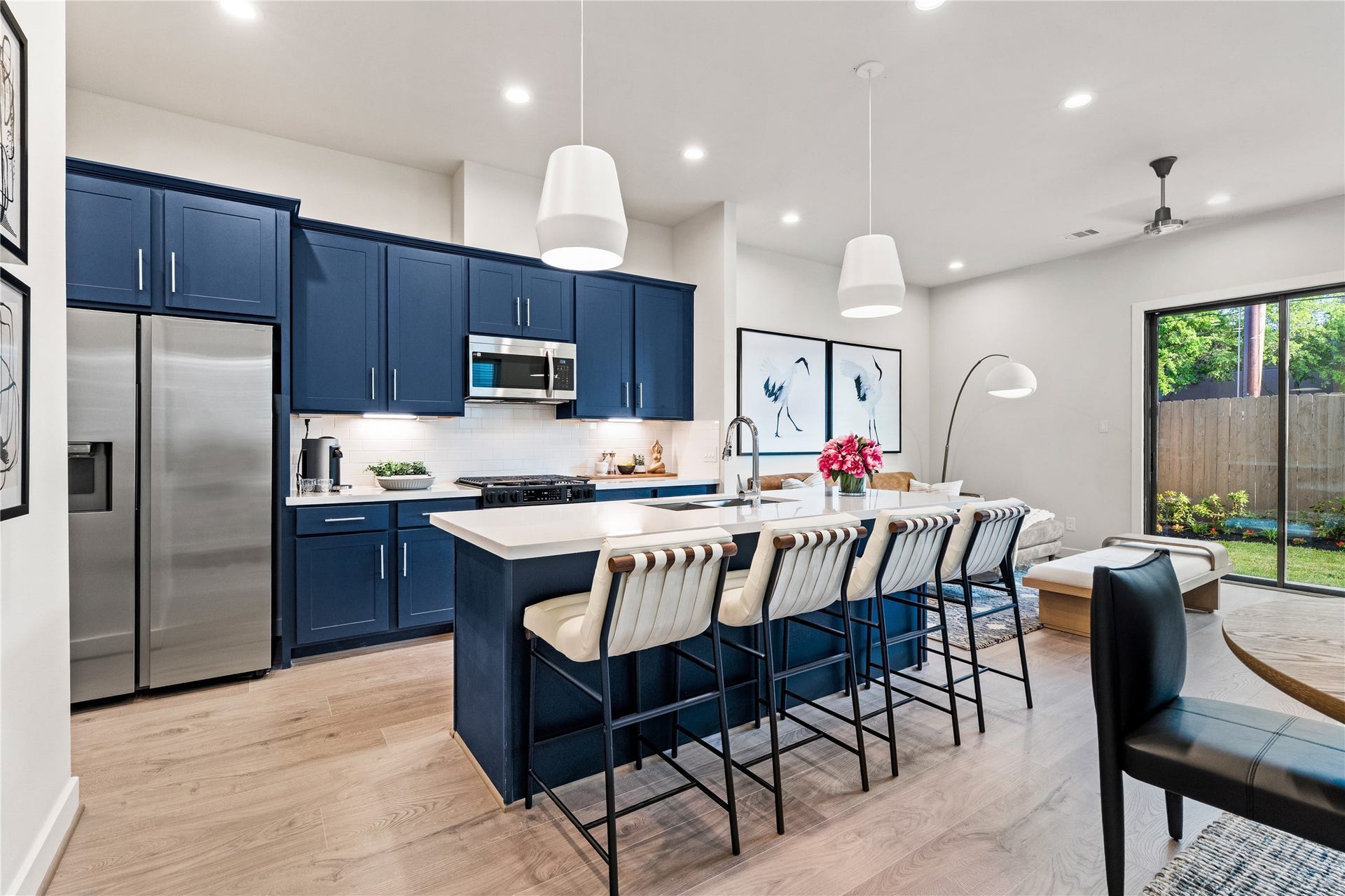 3925 Willowbend Point Drive, Houston, TX 77025 Representative photo showing the communitys model home kitchen. Layout and selections may vary.