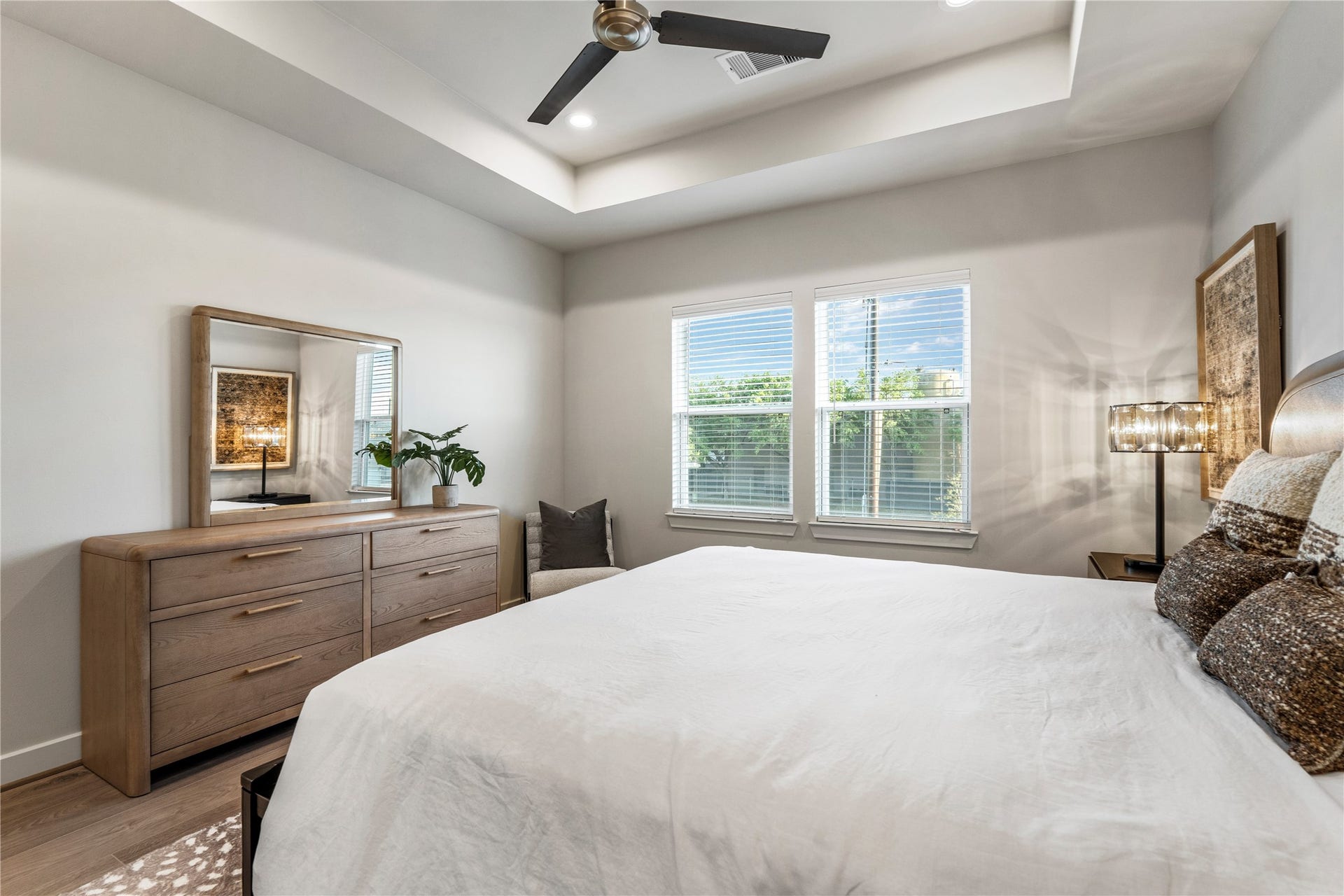 3925 Willowbend Point Drive, Houston, TX 77025 Representative photo showing the communitys model home primary bedroom. Layout and selections may vary.
