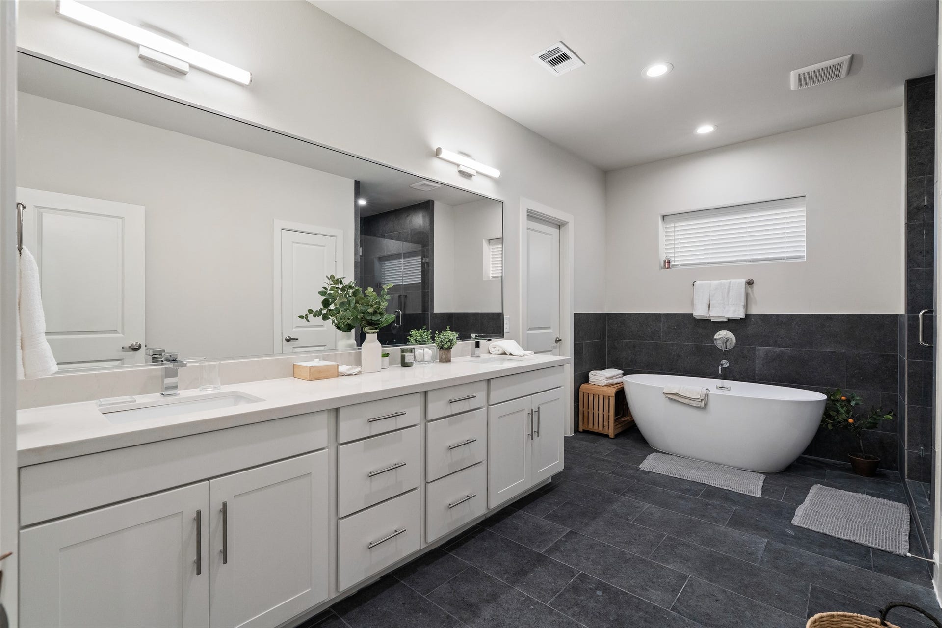 3925 Willowbend Point Drive, Houston, TX 77025 Representative photo showing the communitys model home primary bathroom. Layout and selections may vary.