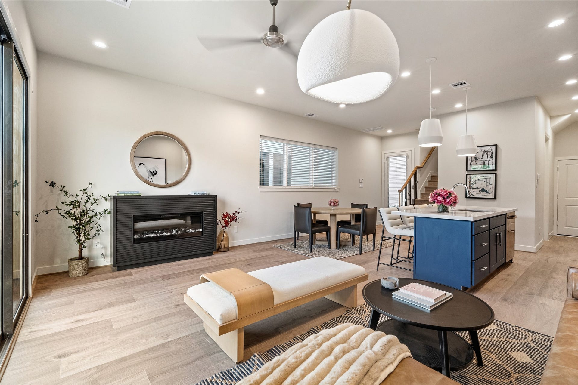 3925 Willowbend Point Drive, Houston, TX 77025 Representative photo showing the communitys model home living room. Layout and selections may vary.