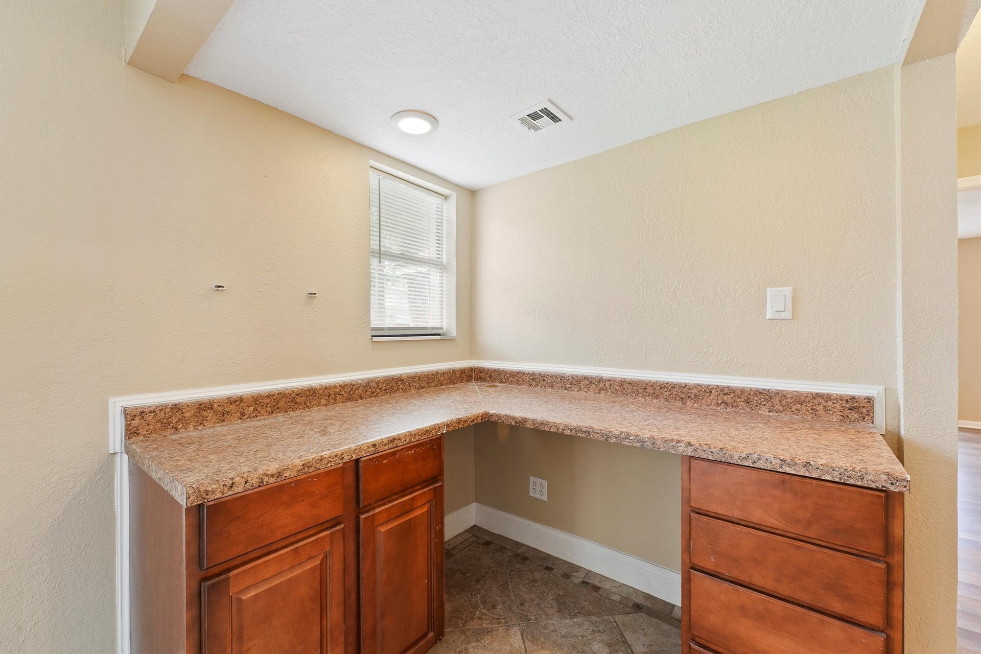 11806 Gardenglen Drive, Houston, TX 77070 Ideal space for a functional study nook or imagine a dedicated refreshment station while hosting.