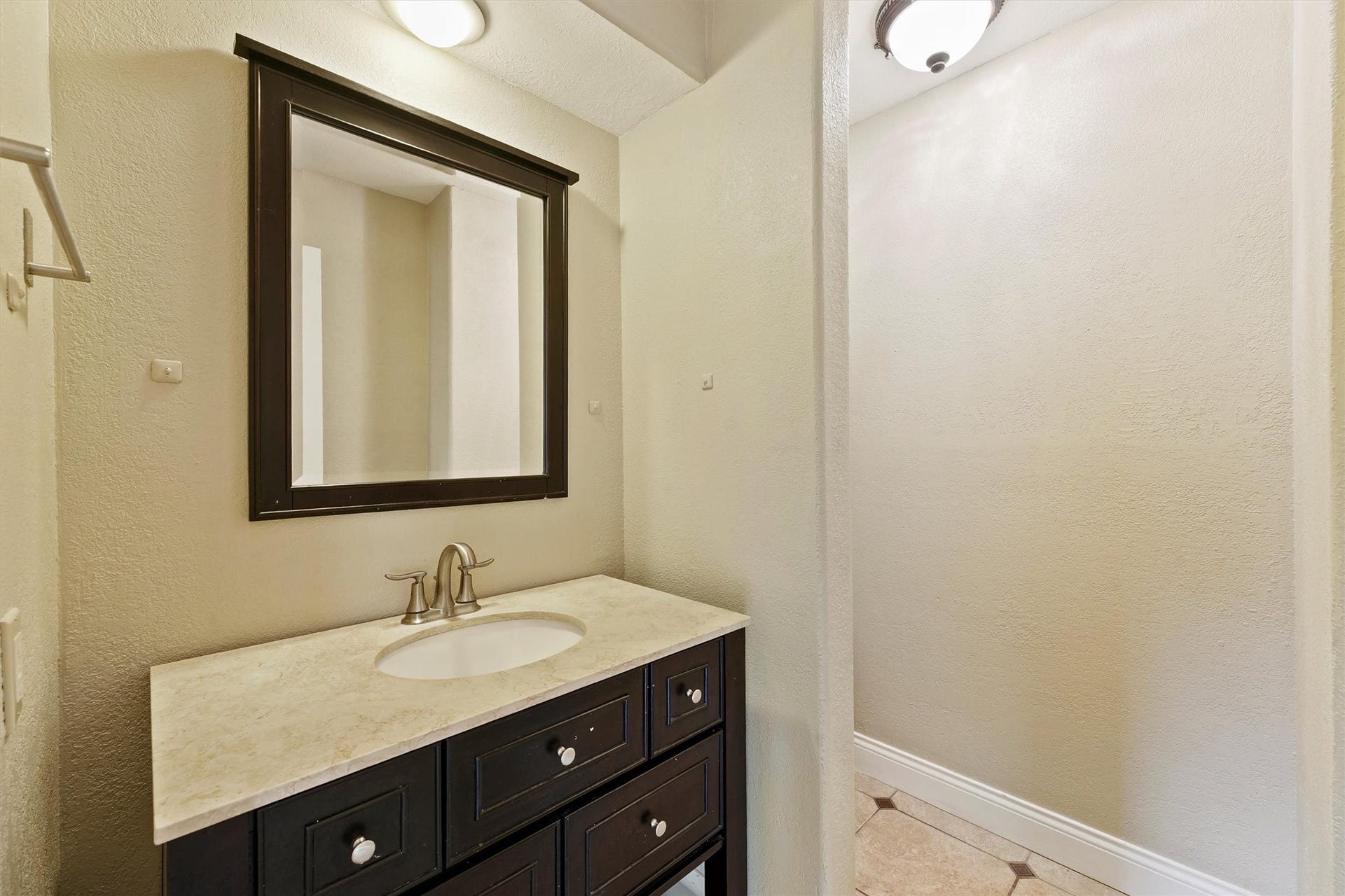 11806 Gardenglen Drive, Houston, TX 77070 Downstairs half bathroom.