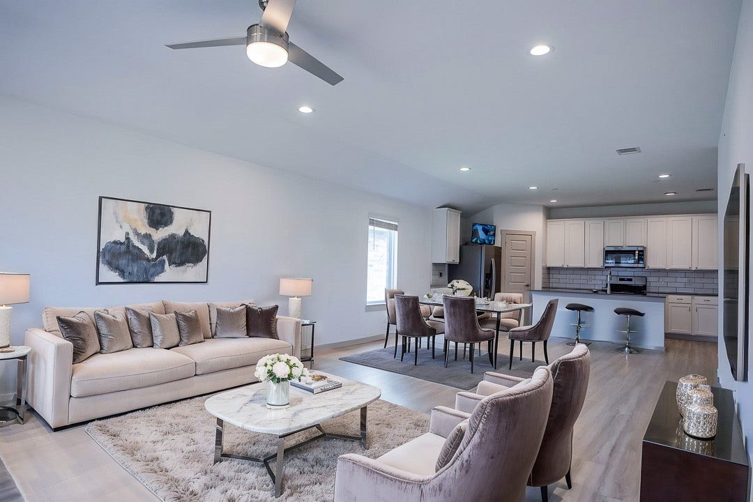 6906 Halifax Harvest Lane, Richmond, TX 77407 Experience modern living in this beautifully open-concept space, virtually staged to inspire your dream home design.
