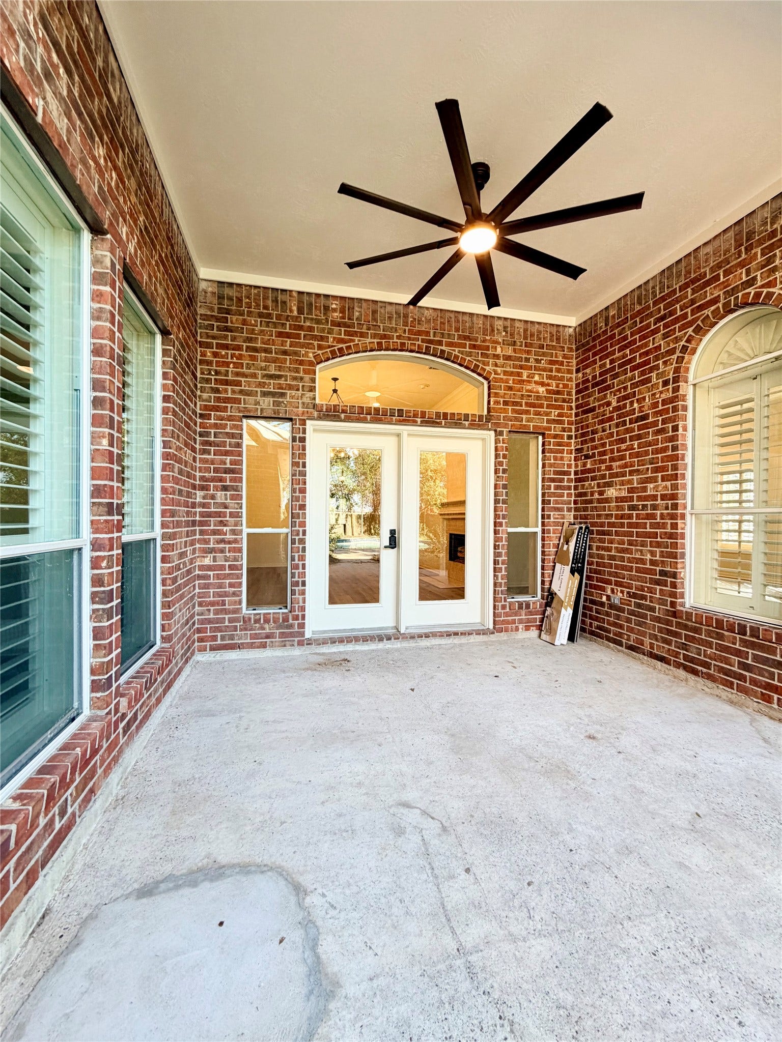 20434 Long Cypress Drive, Spring, TX 77388 Covered back porch w/ a new 72 in ceiling fan. There is more space around the pool for additional patio furniture and/ot pool loungers