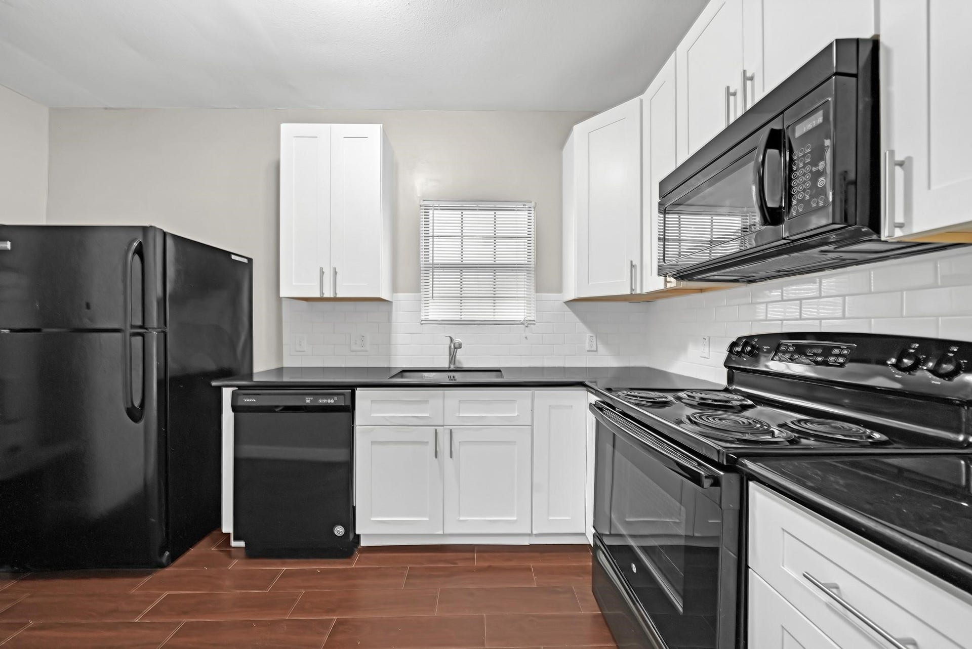 2915 Isabella Street, #A, Houston, TX 77004 Kitchen offers plenty of cabinet storage and countertop space. Refrigerator included.