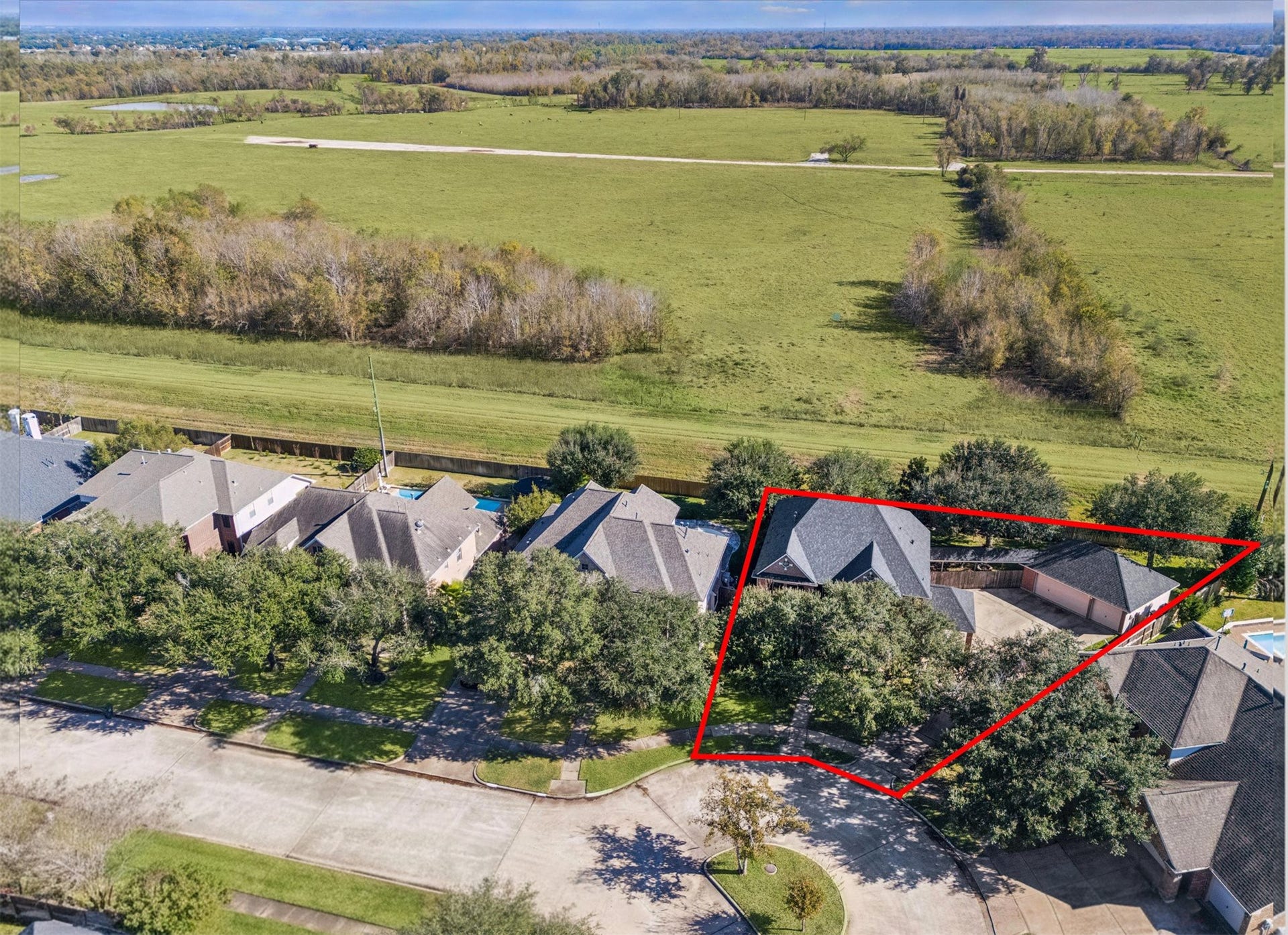 EXPANSIVE CUL-DE-SAC LOT BACKING TO GREENSPACE WITH NO BACK NEIGHBORS, OFFERING RARE PRIVACY AND OPEN VIEWS IN GREATWOOD HIGHLAND PARK.