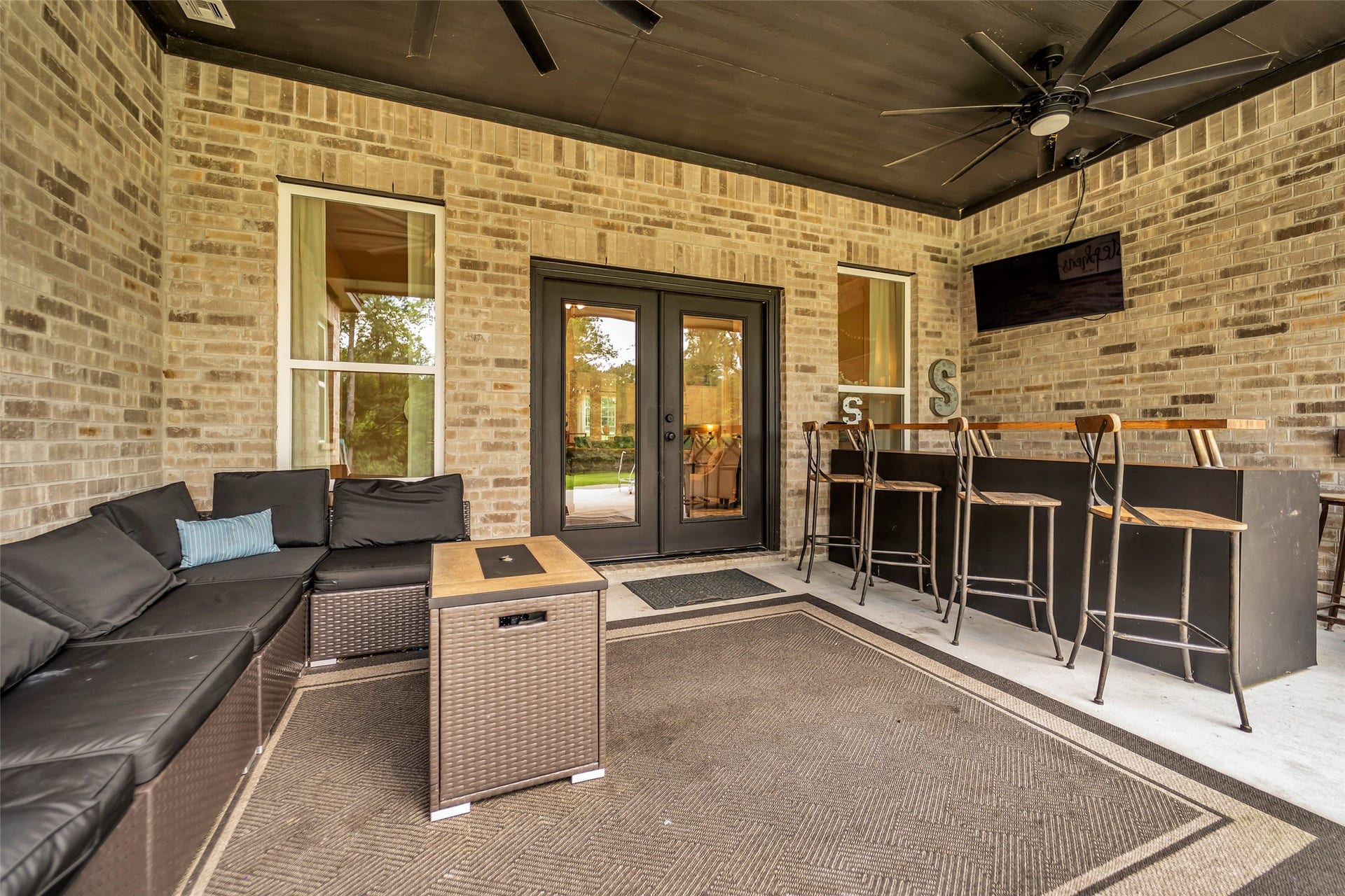 14663 Diamond Shores, Willis, TX 77378 Covered back patio with space for outdoor living