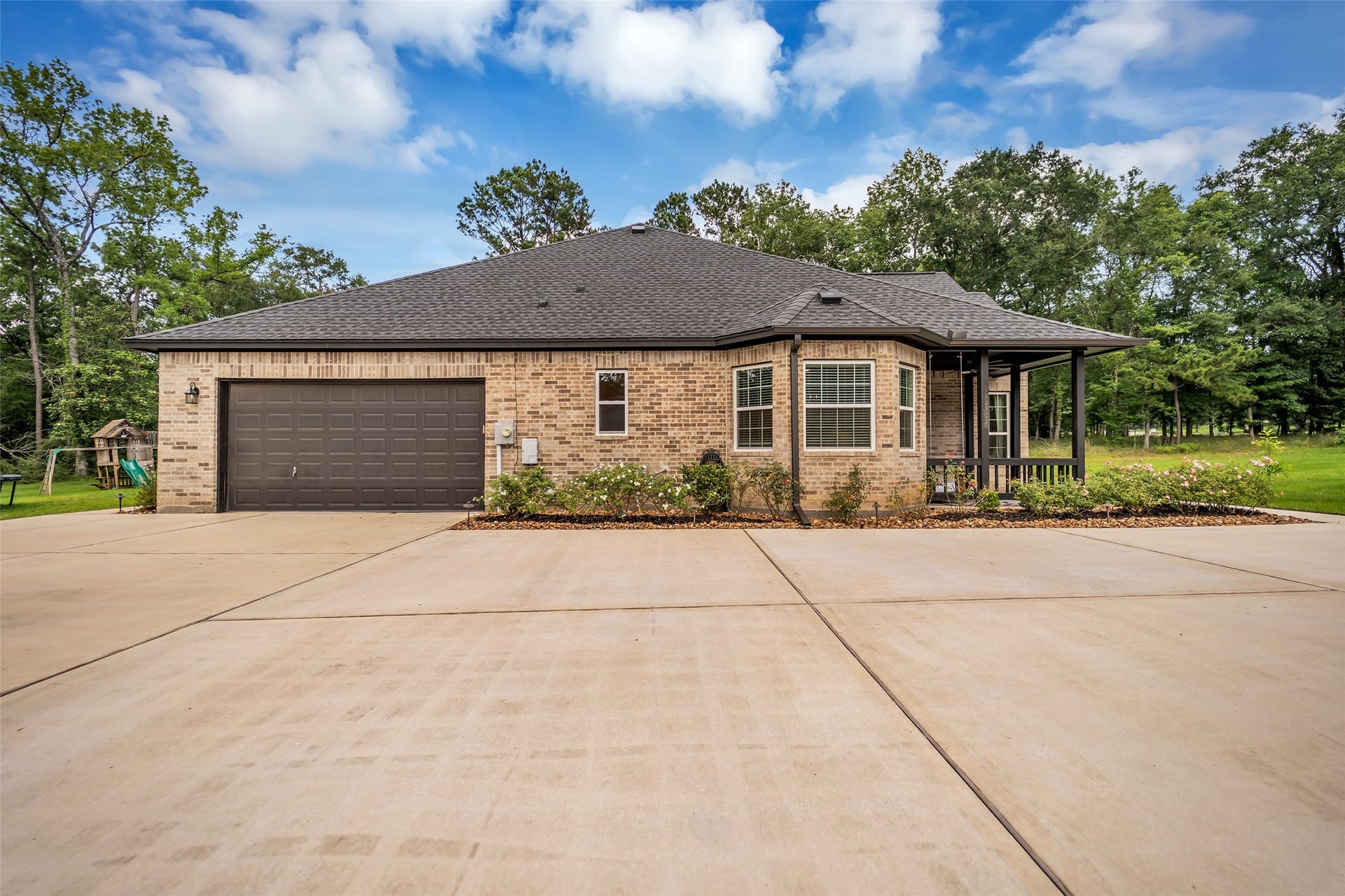 14663 Diamond Shores, Willis, TX 77378 Attached two car garage.