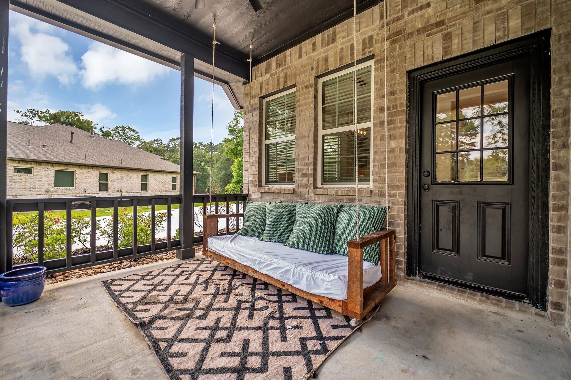 14663 Diamond Shores, Willis, TX 77378 Enjoy a cup of coffee on your covered front porch