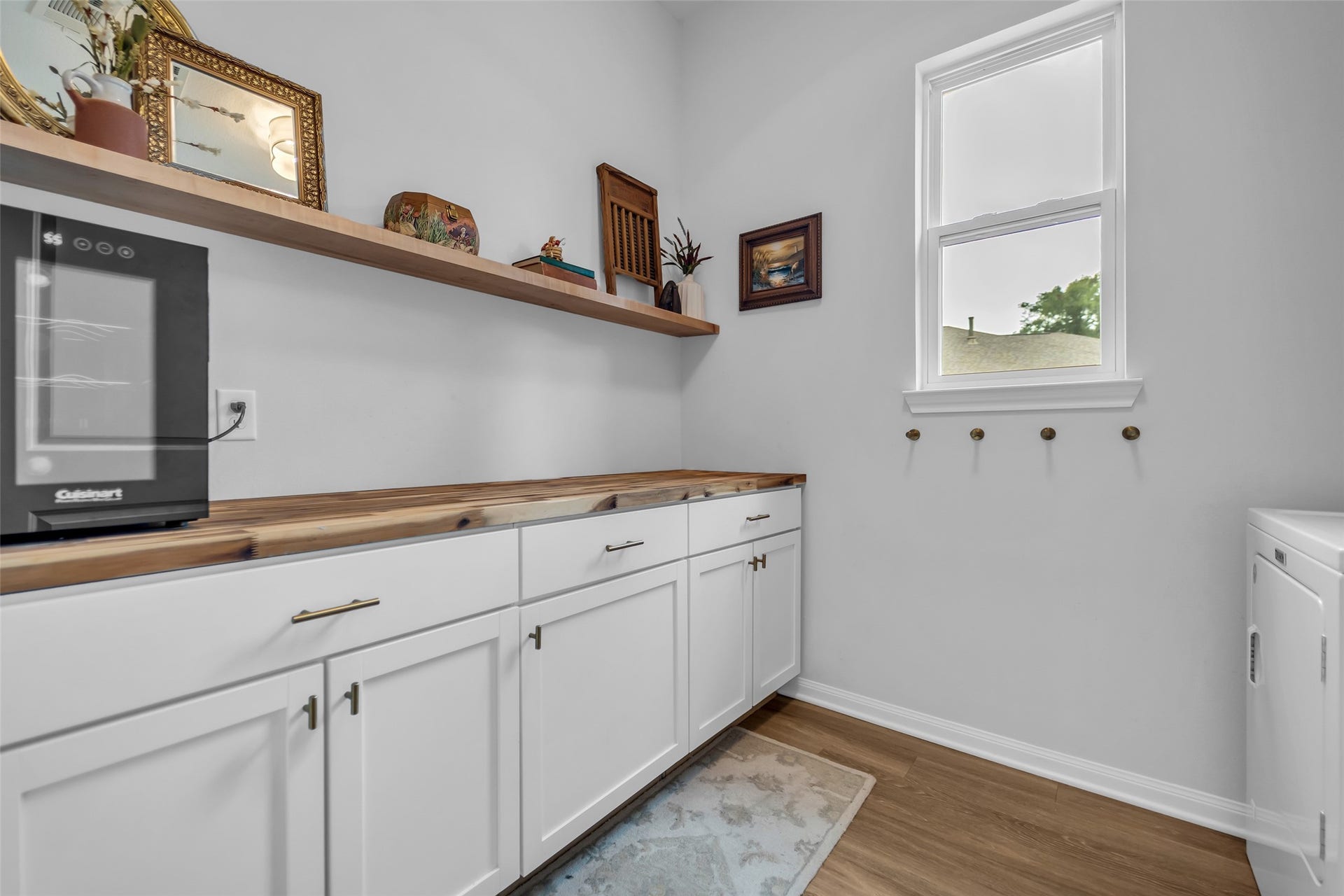 14663 Diamond Shores, Willis, TX 77378 Laundry room with storage, counter space and hooks for everyday life