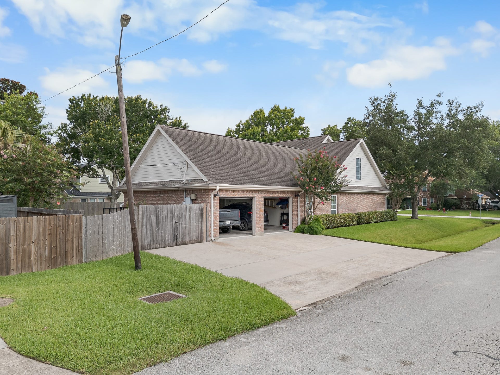 603 Renaldo Street, Dickinson, TX 77539 Side entry, generously sized double garage with