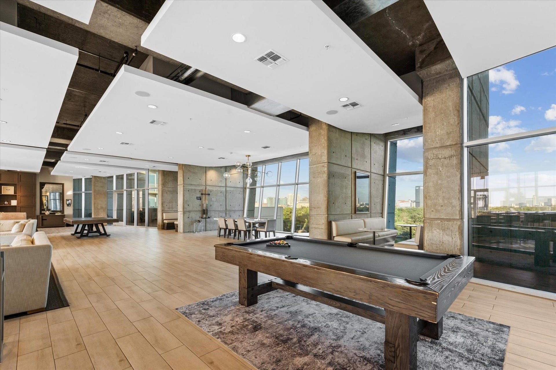 The lounge/rec room features pool tables, ping pong, large tvs, and more