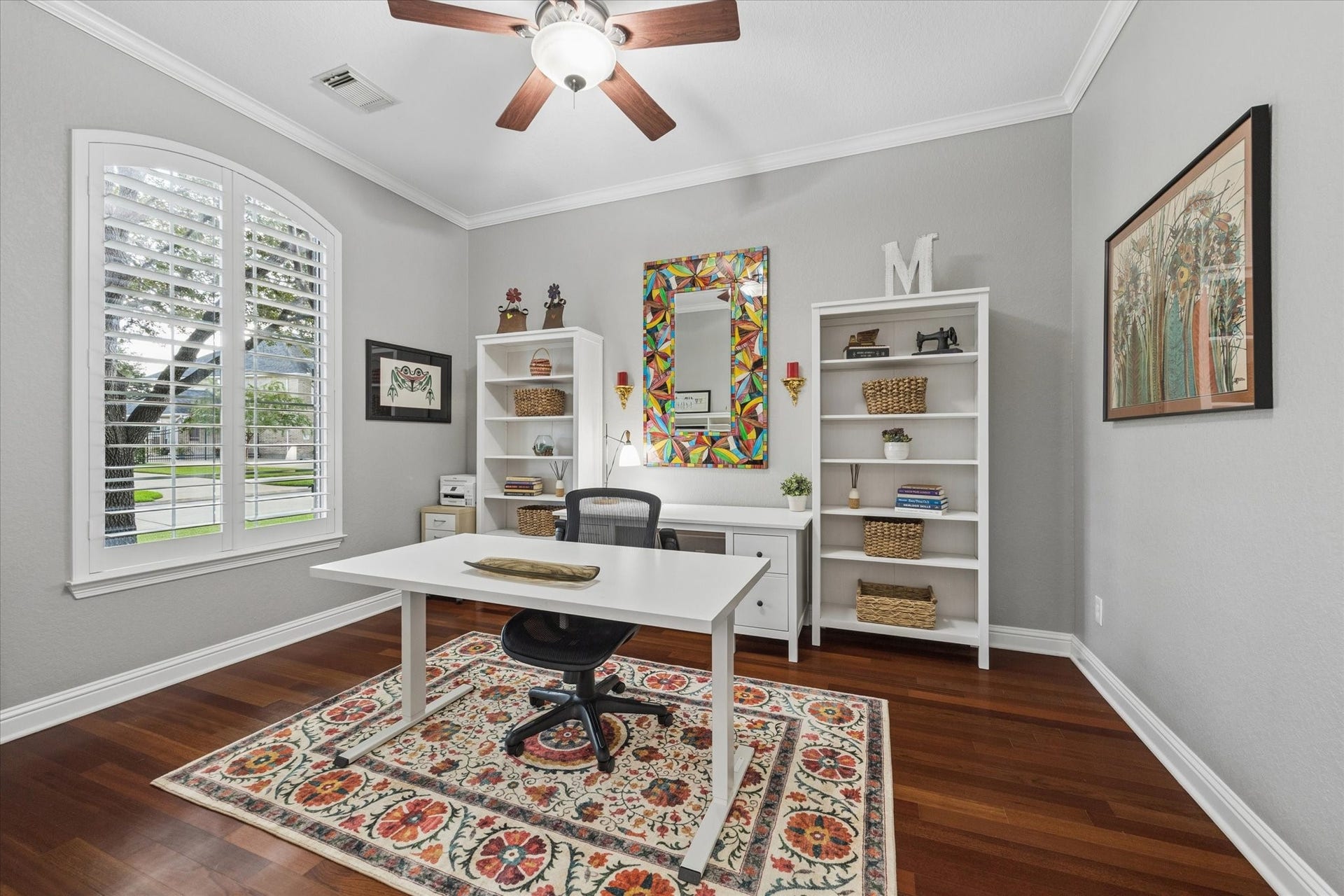 3523 Silvercreek Drive, Manvel, TX 77578 Home office located at the front of home with view of mature trees, natural light, plantation shutters, hardwood floors, high ceilings and ceiling fan with light
