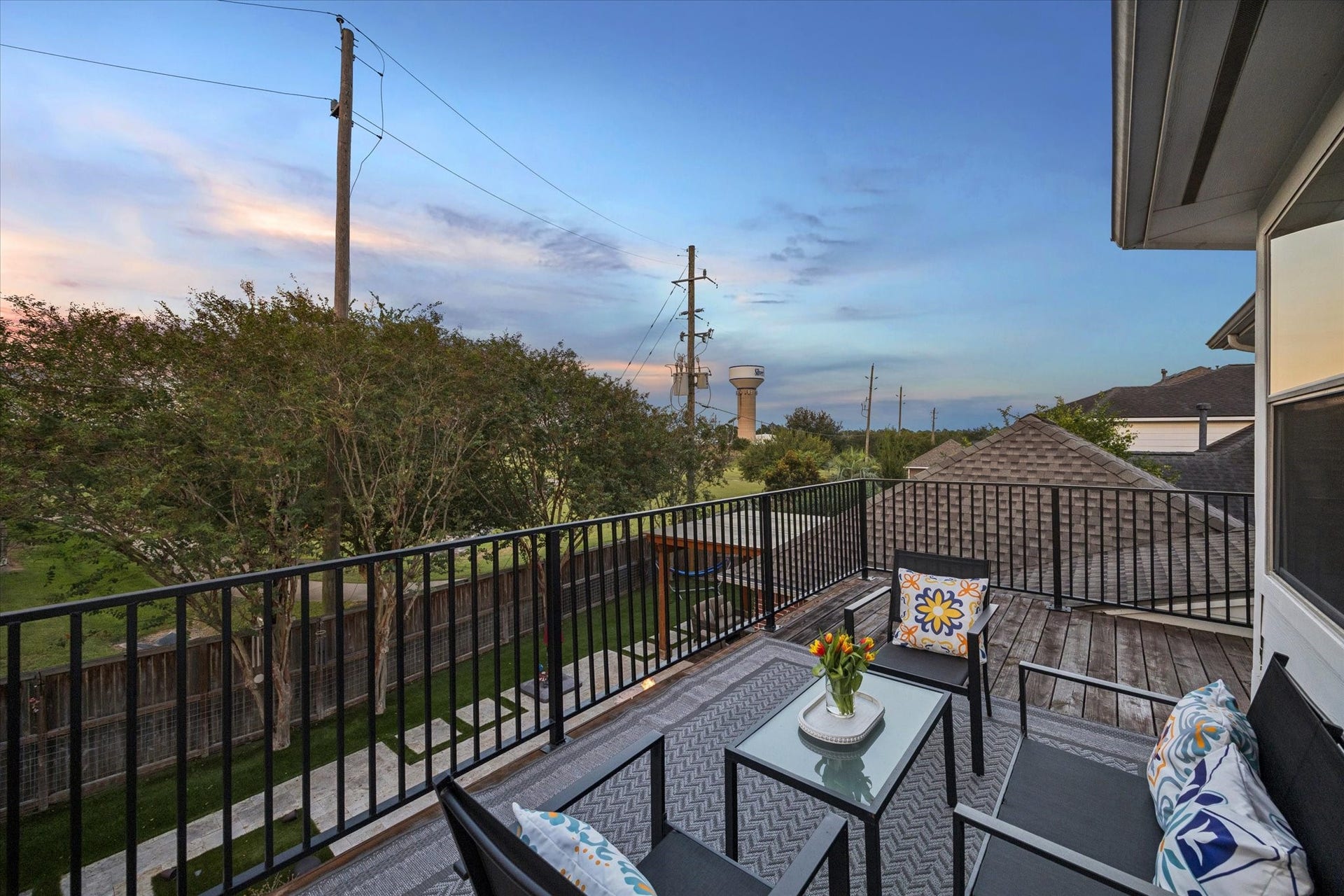 3523 Silvercreek Drive, Manvel, TX 77578 Second floor balcony off the game room showing walking trail and no back neighbors
