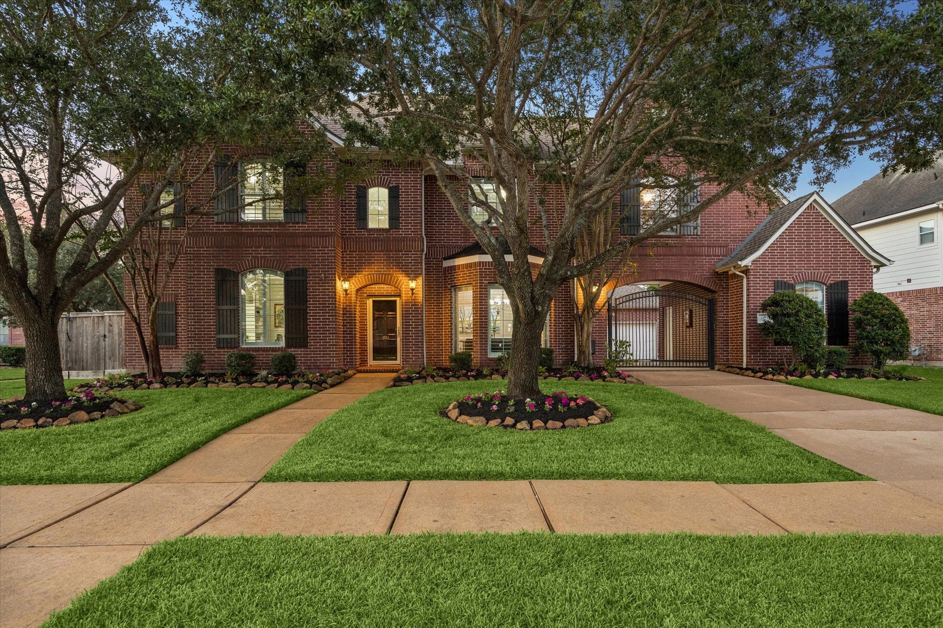 3523 Silvercreek Drive, Manvel, TX 77578 Beautiful brick home with accent shutters, mature trees and nicely landscaped yard