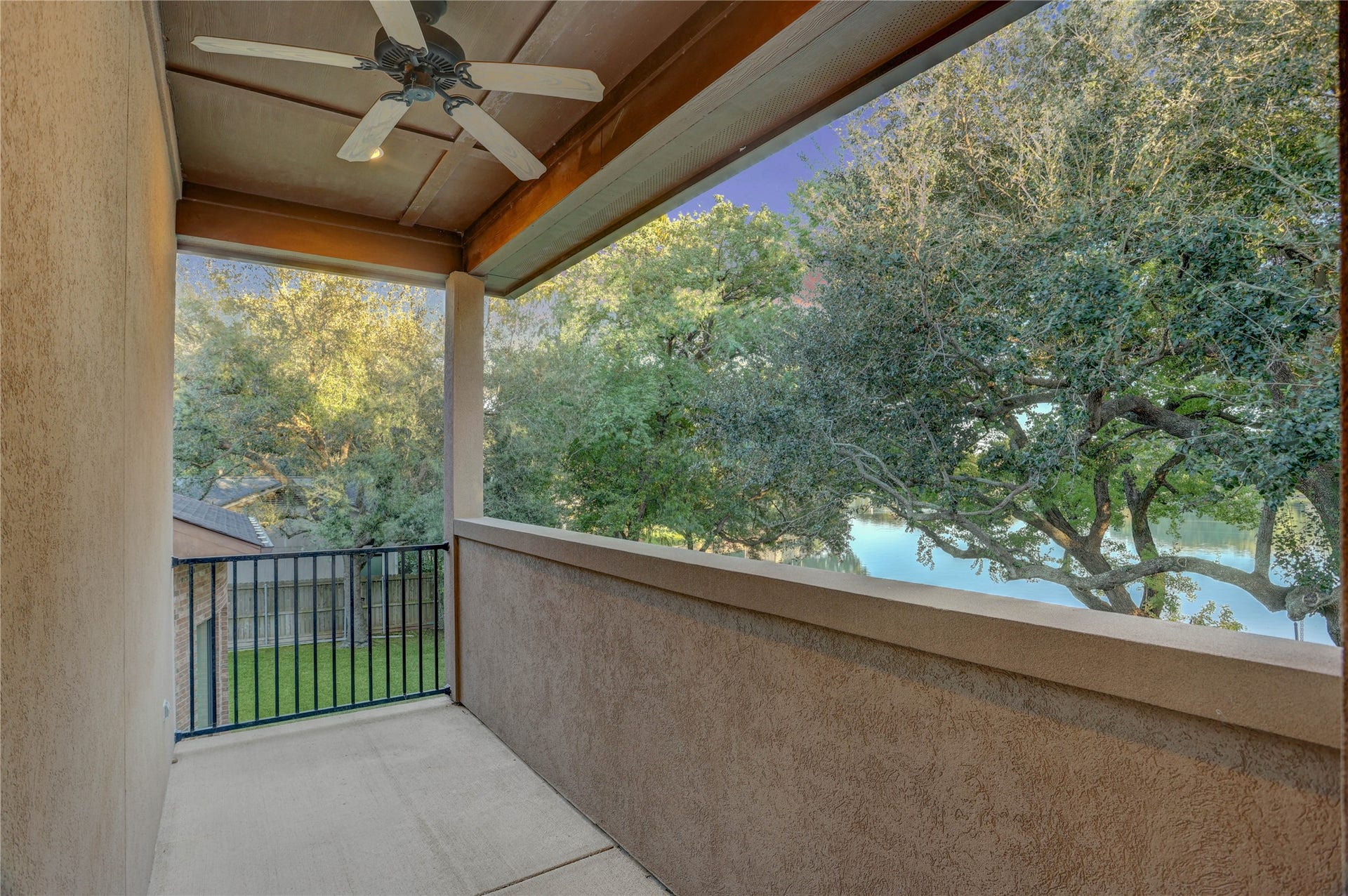 702 Piedmont Street, Sugar Land, TX 77478 One of the secondary bedrooms has a private balcony with a breathtaking lake view