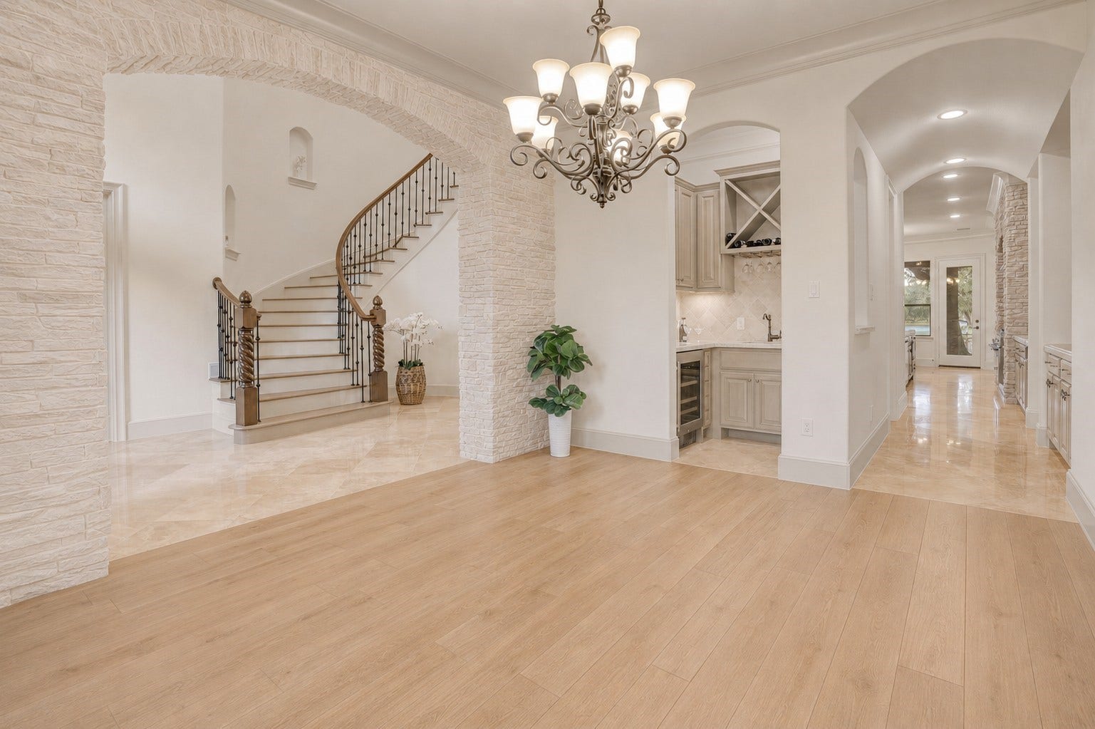 702 Piedmont Street, Sugar Land, TX 77478 Two simple changes, a stone slurry and lighter wood finishes yield a dramatic aesthetic change