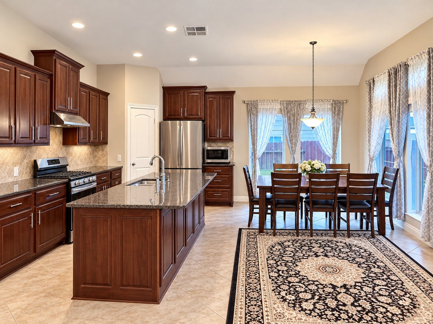 13601 Durango Pass Drive, Pearland, TX 77584 Kitchen facing backyard and open to Breakfast and living room